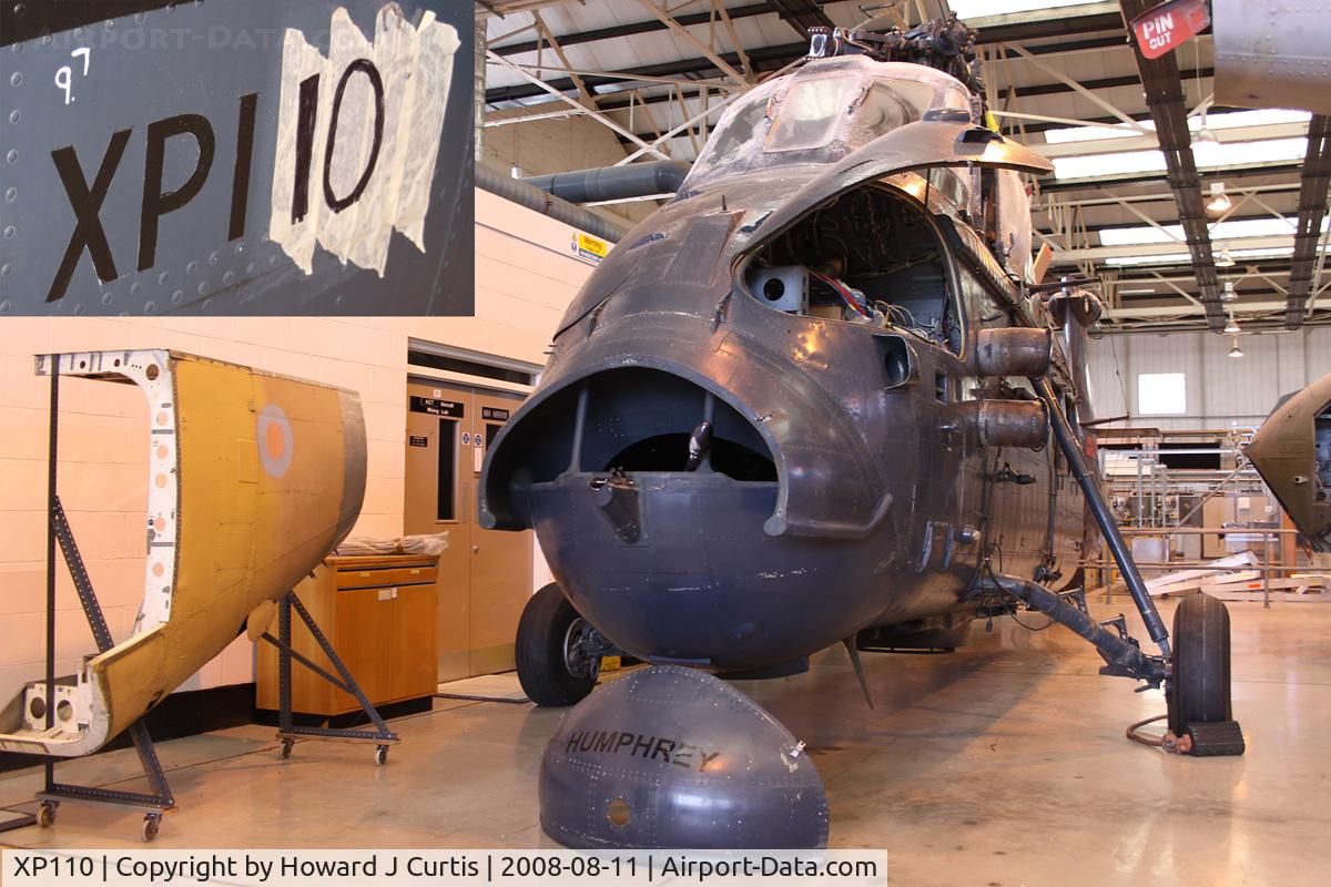 XP110, 1962 Westland Wessex HAS.3 C/N WA.61, At the Air Engineering & Survival School, Gosport, Hampshire. This had been recently painted as XP142 'Humphrey' for a film. Hence the masking tape and marker pen [see inset] to correct the registration.