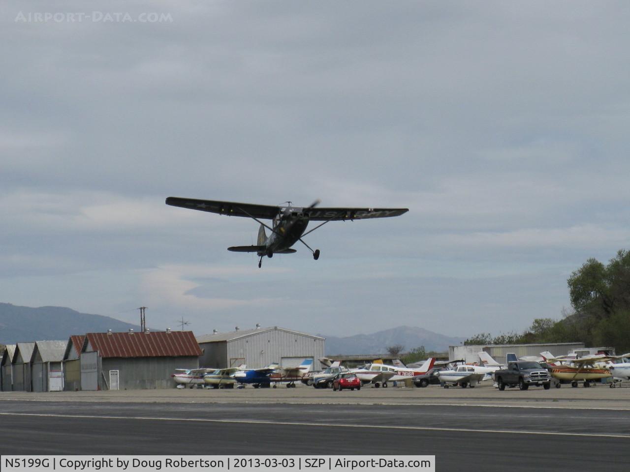 N5199G, 1953 Cessna 305A C/N 22118, 1953 Cessna 305A O-1 BIRD DOG, Continental O-470-11 213 Hp, takeoff climb Rwy 22