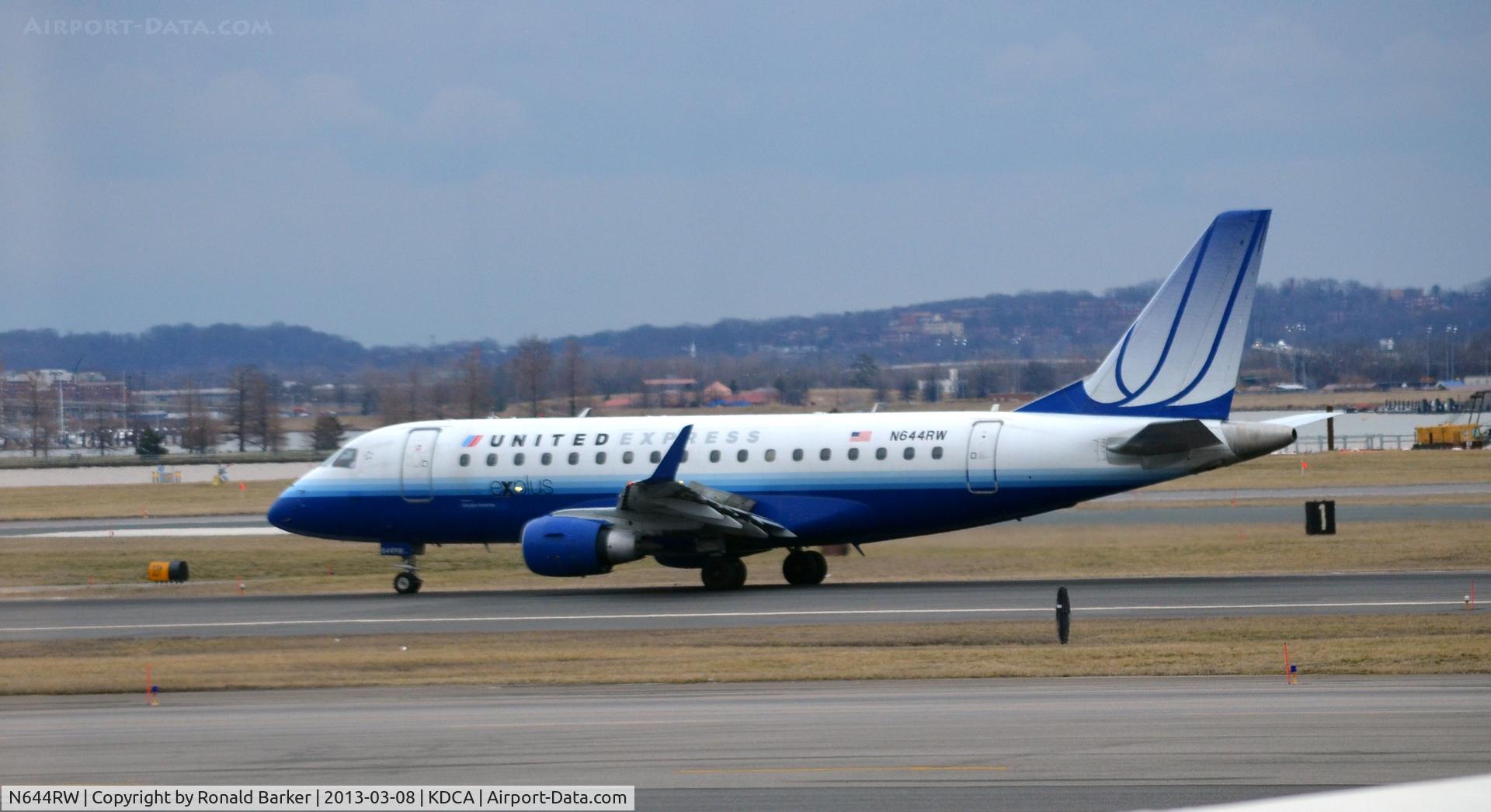 N644RW, 2004 Embraer 170SE (ERJ-170-100SE) C/N 17000061, Aircraft just aborted, note raised spoilers, it then turned off the active runway