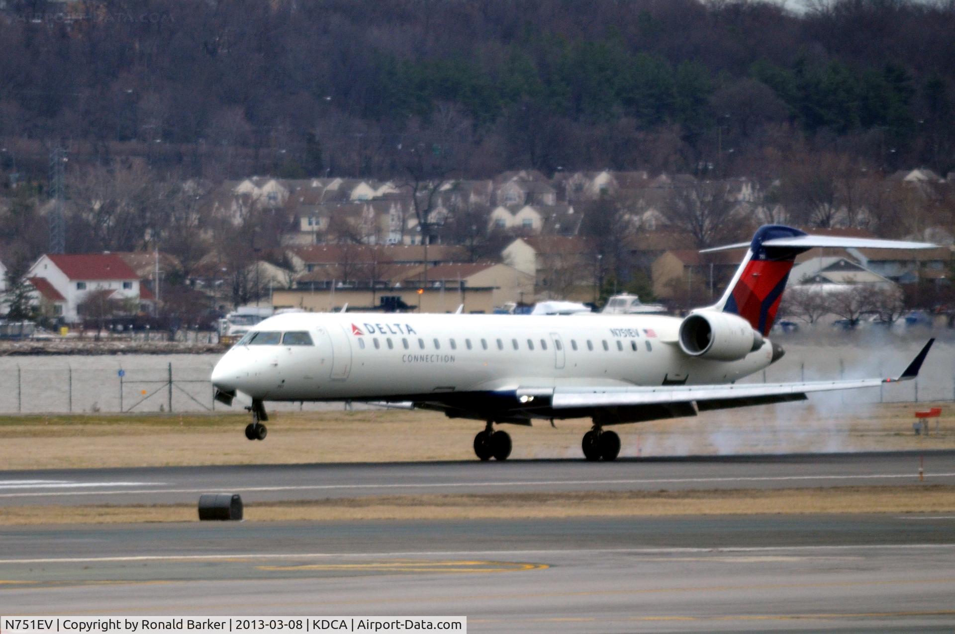 N751EV, 2004 Bombardier CRJ-701 (CL-600-2C10) Regional Jet C/N 10163, Landing touchdown DCA