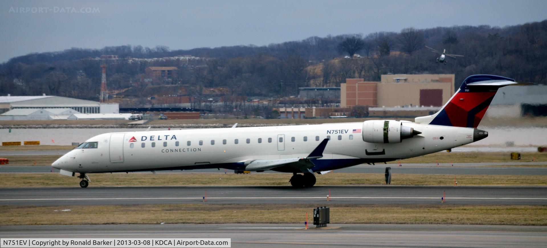 N751EV, 2004 Bombardier CRJ-701 (CL-600-2C10) Regional Jet C/N 10163, Landing roll DCA