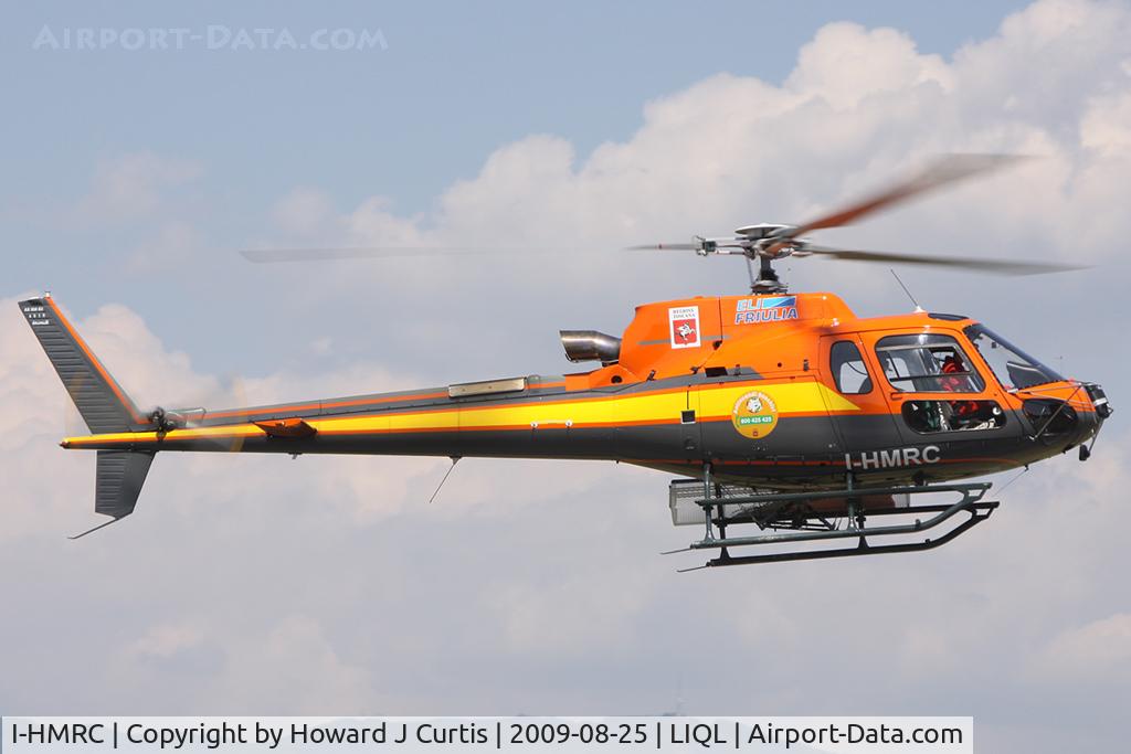 I-HMRC, 2008 Eurocopter AS-350B-3 Ecureuil Ecureuil C/N 4519, Elifiulia S.r.l., wearing a red 'Regione Toscana' badge. The other badge, worn by most helicopters here this day, says 'Antincendi Boschivi' and the number underneath is for reporting forest fires.