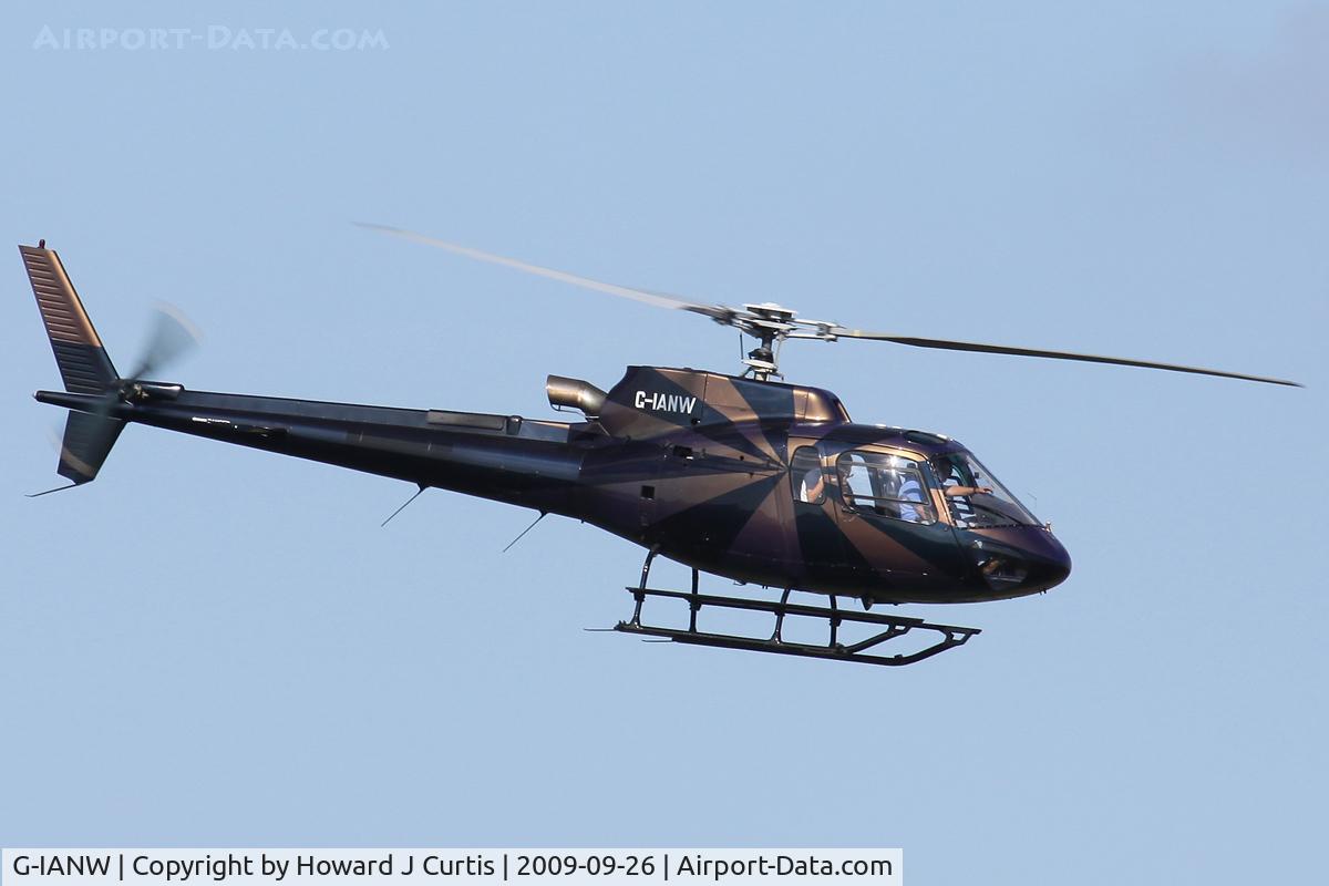 G-IANW, 2000 Eurocopter AS-350B-3 Ecureuil Ecureuil C/N 3447, Flying over the castle at Corfe Castle, Dorset.
