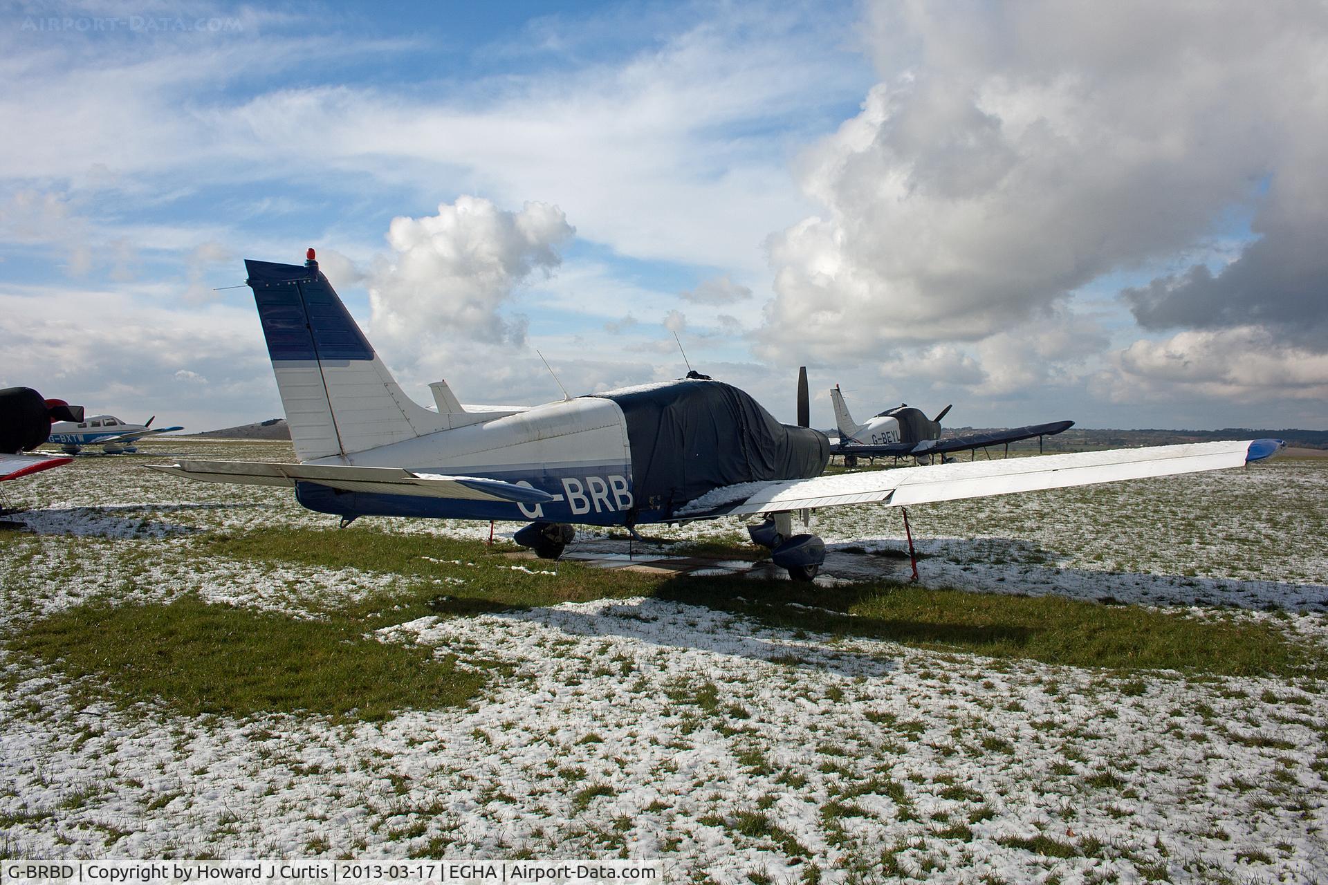 G-BRBD, 1974 Piper PA-28-151 Cherokee Warrior C/N 28-7415315, Compton Abbas in the snow. G-BRBD, a resident here, creates an aeroplane-shaped pattern in the snow.