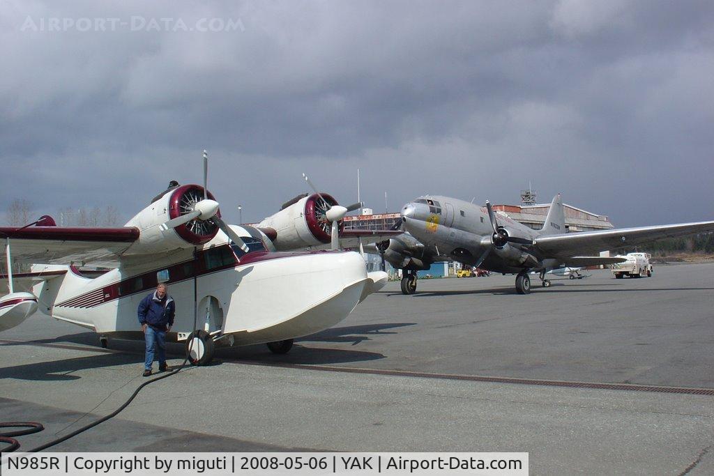 N985R, 1944 Grumman G-21A Goose C/N B-86, C-46 waiting for Goose to fuel.