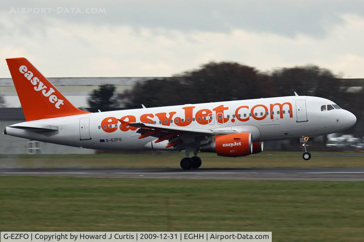 G-EZFO, 2009 Airbus A319-111 C/N 4080, easyJet. Taken from the Bournemouth Aviation Museum's viewing bus. On departure from runway 08.