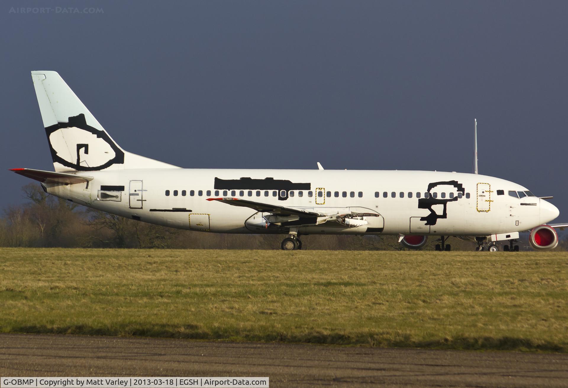 G-OBMP, 1992 Boeing 737-3Q8 C/N 24963, Sat at NWI with all markings taped over.