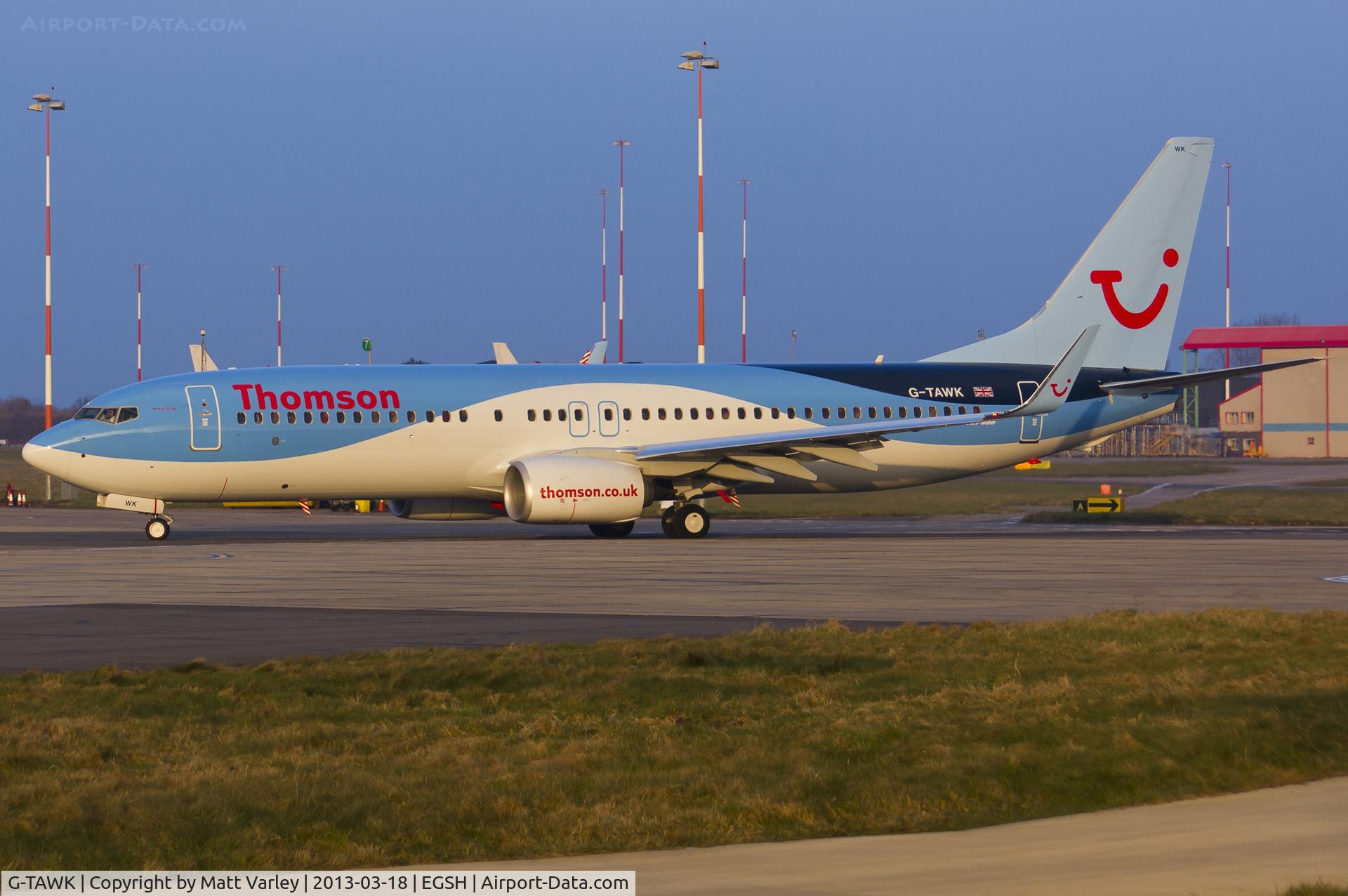 G-TAWK, 2012 Boeing 737-8K5 C/N 37239, Taxiing for departure in the setting sun.