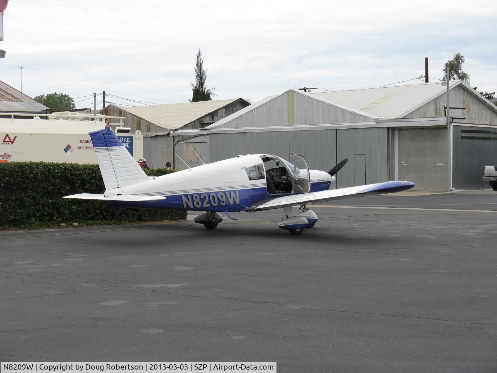 N8209W, 1965 Piper PA-28-180 Cherokee C C/N 28-2341, 1965 Piper PA-28-180 CHEROKEE, Lycoming O-360-A3A 180 Hp, refueling