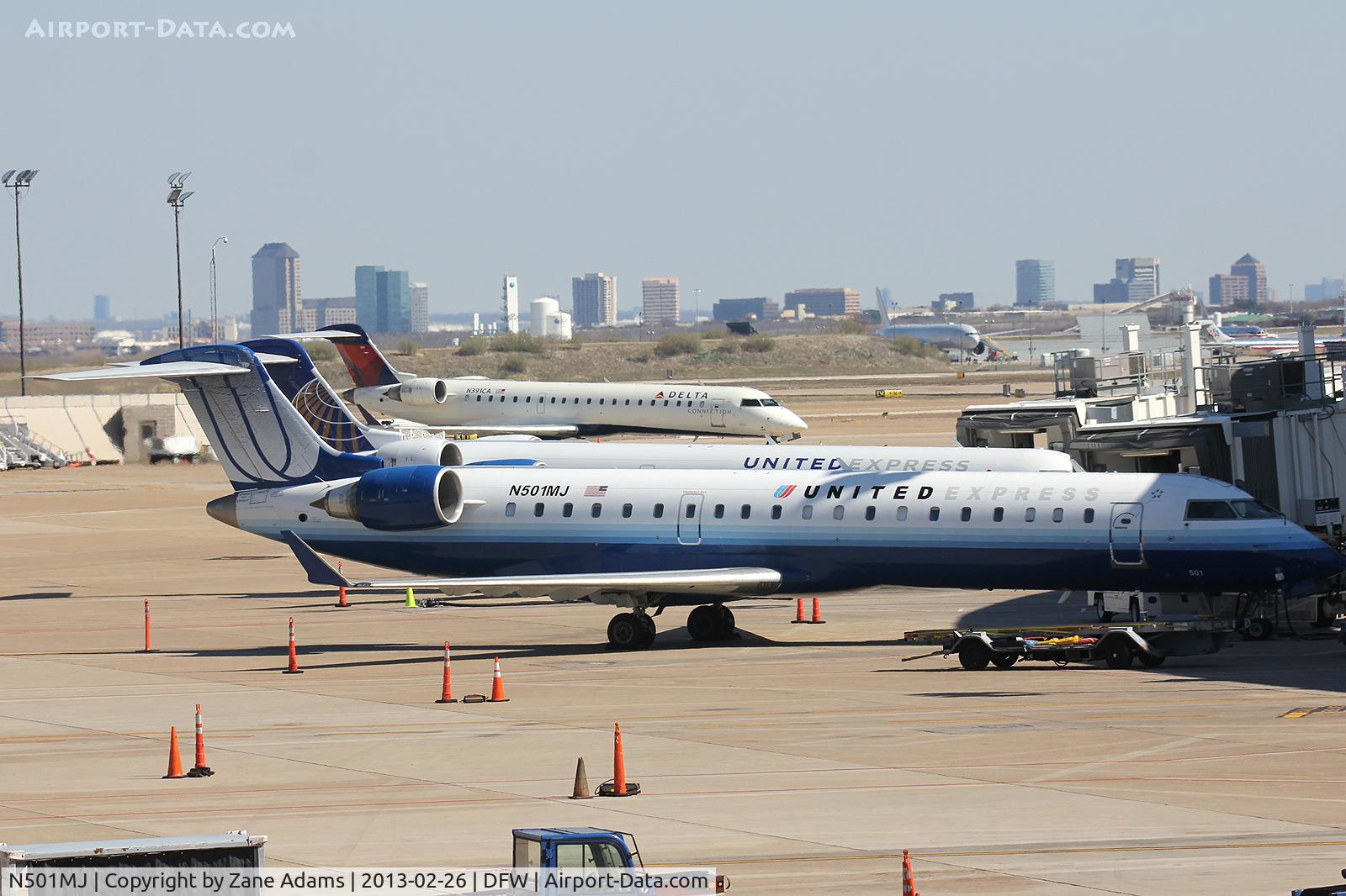 N501MJ, 2002 Canadair CL-600-2C10 Regional Jet CRJ-700 C/N 10047, At the gate  - DFW Airport