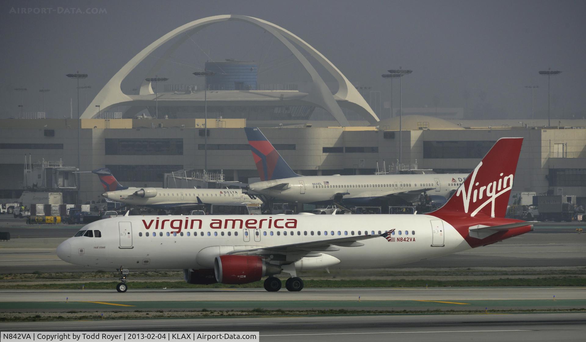 N842VA, 2011 Airbus A320-214 C/N 4805, Taxiing to gate on a foggy morning