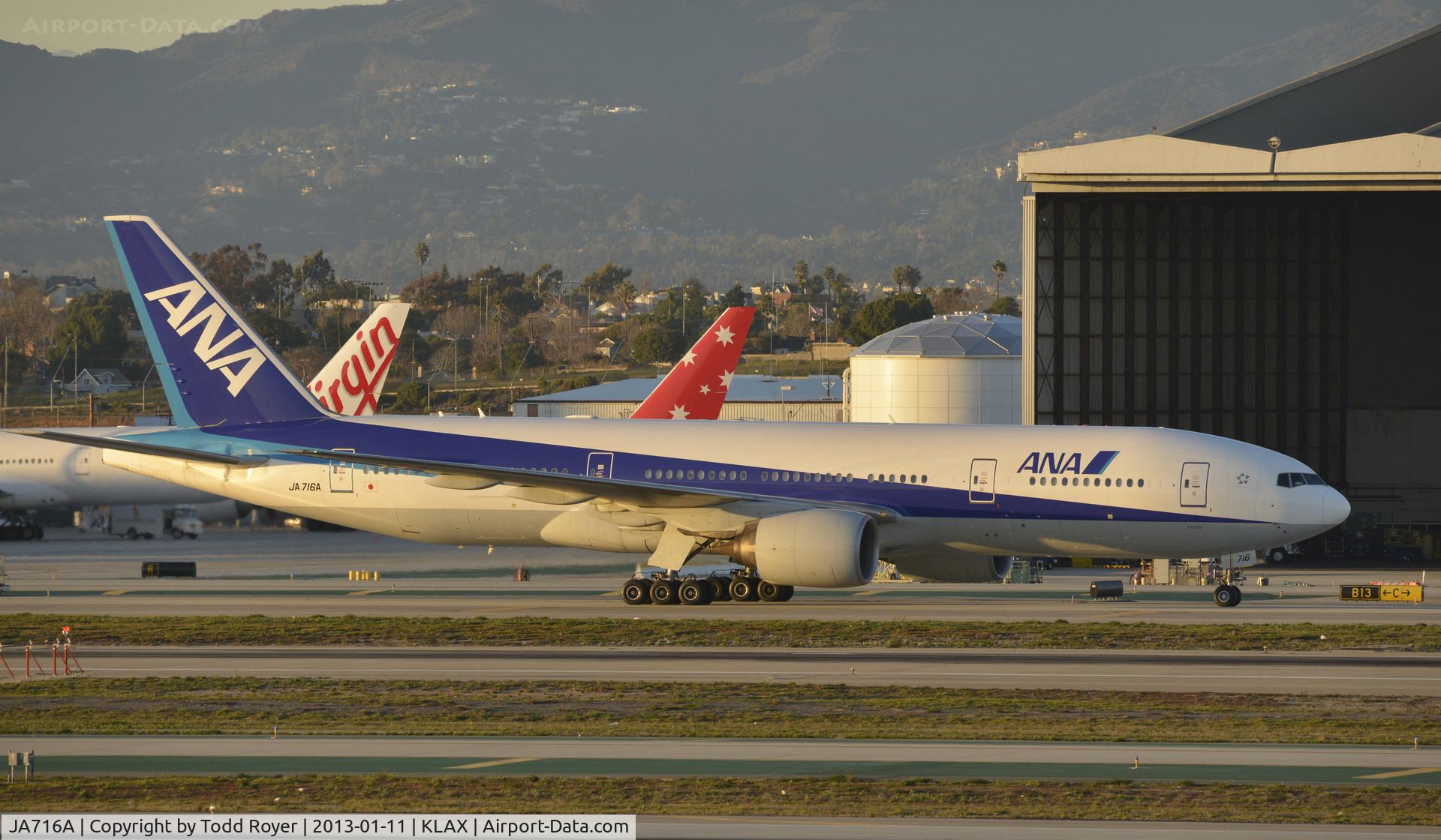JA716A, 2006 Boeing 777-287/ER C/N 33414, Taxiing for departure at LAX