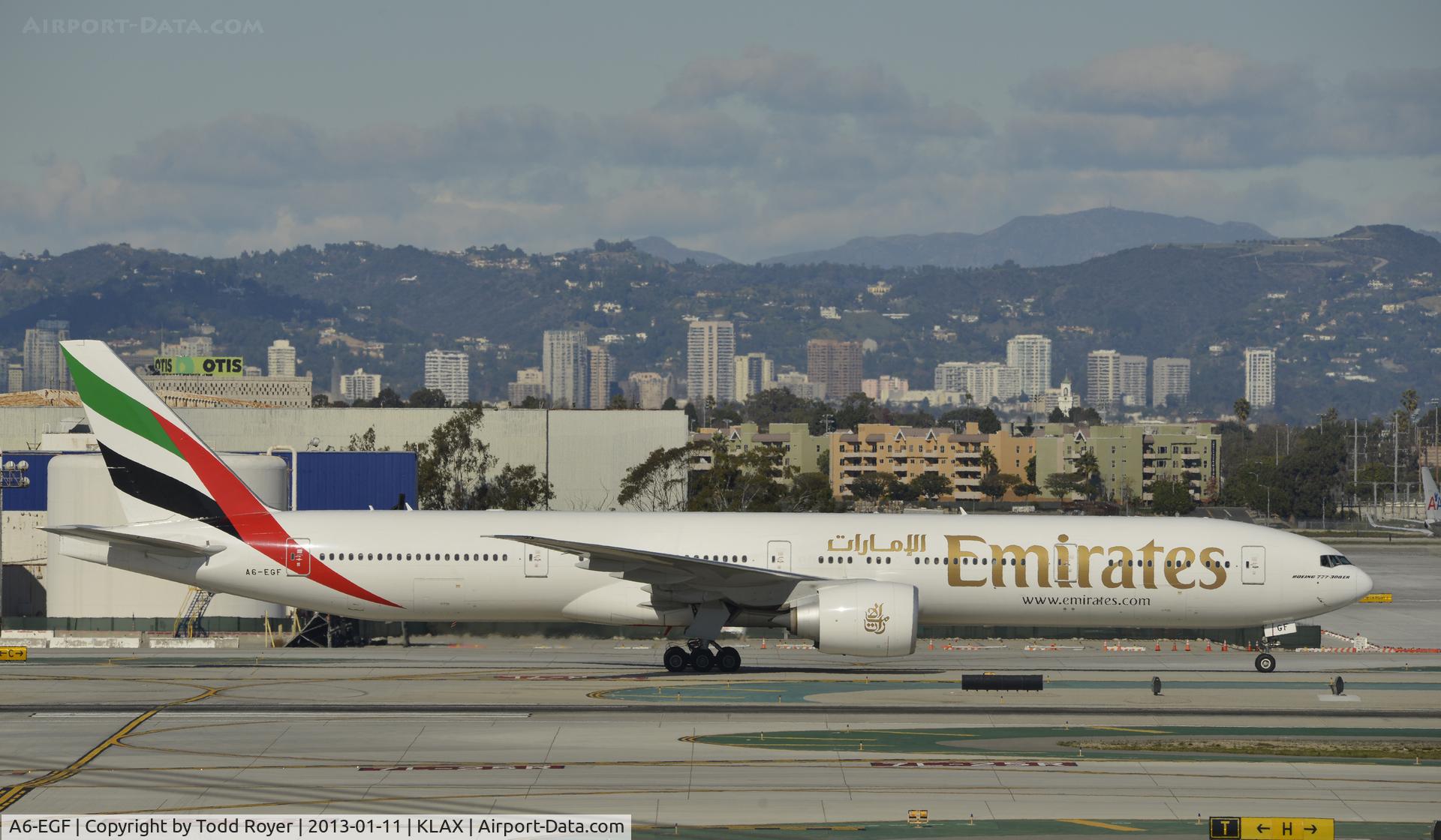 A6-EGF, 2011 Boeing 777-31H/ER C/N 38987, Taxiing to gate at LAX