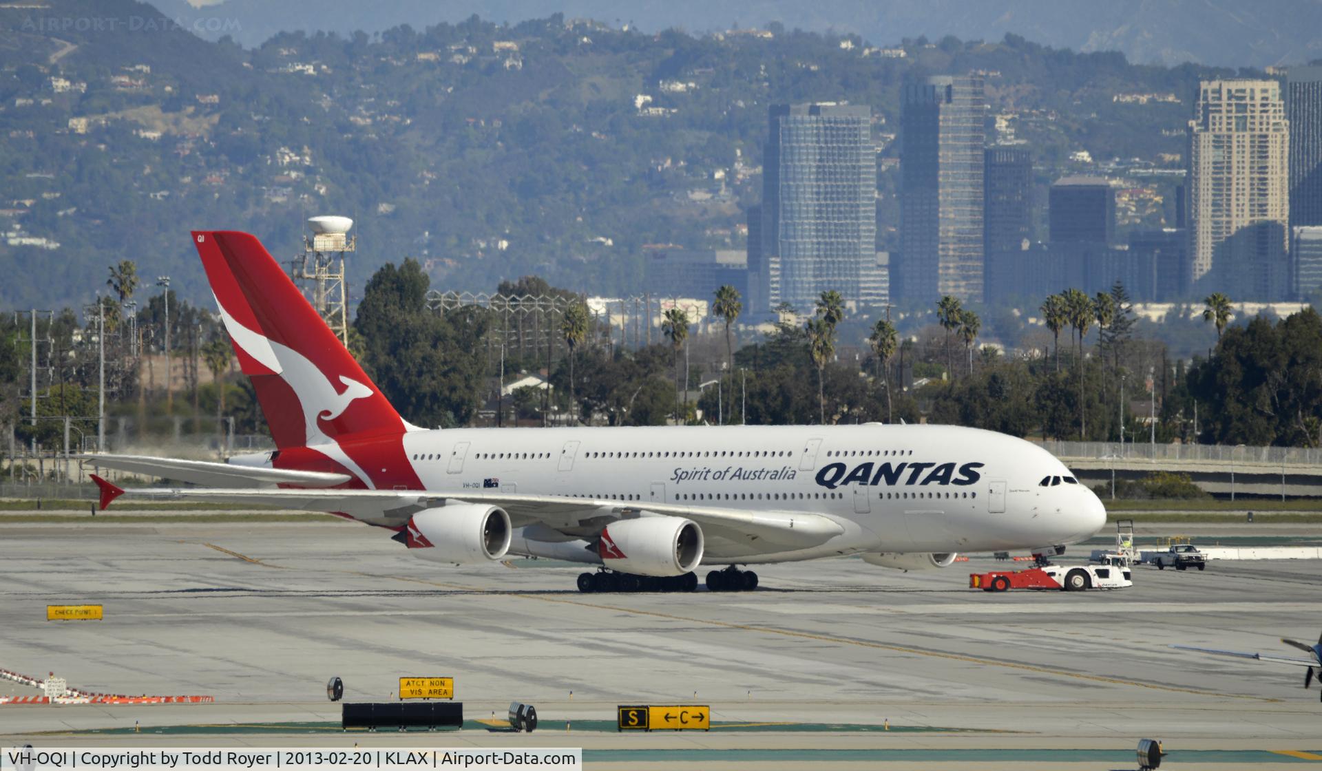 VH-OQI, 2010 Airbus A380-842 C/N 055, Getting a tow at LAX