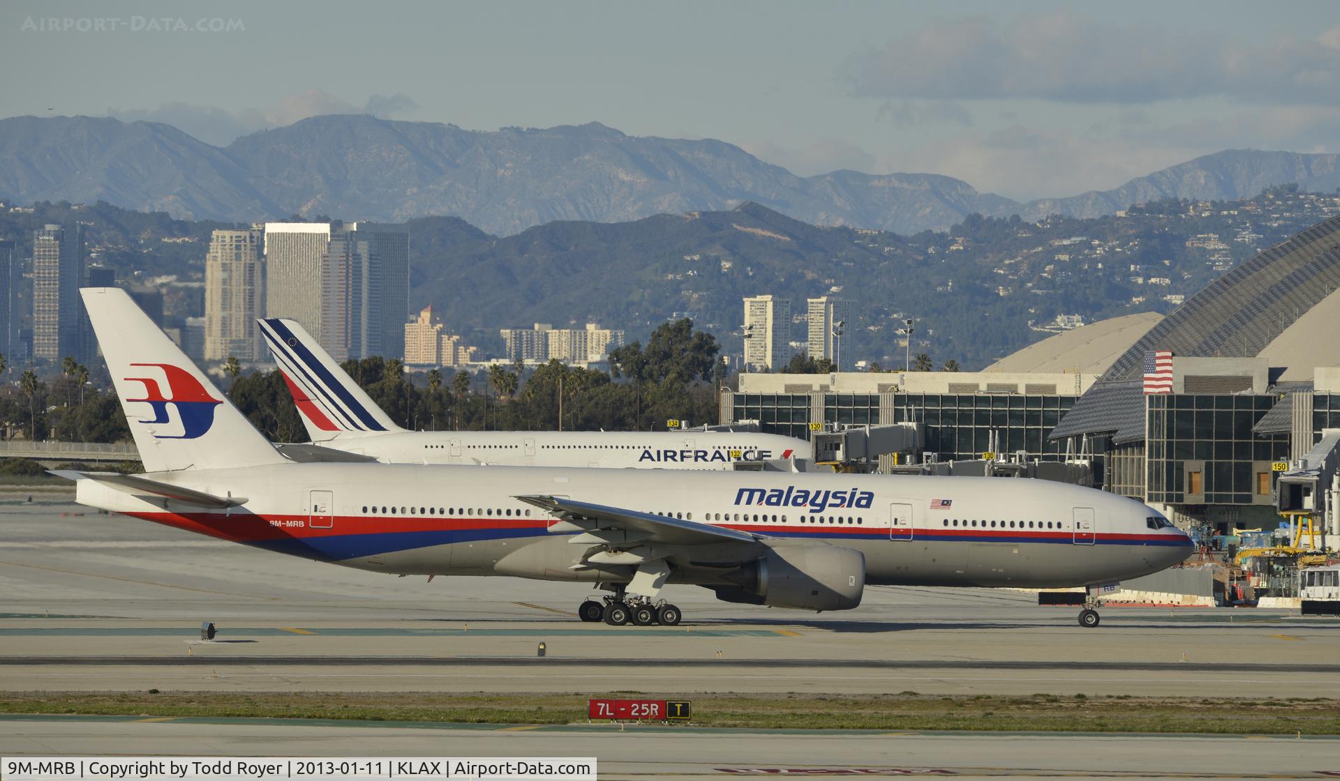 9M-MRB, 1997 Boeing 777-2H6/ER C/N 28409, Taxiing to gate at LAX