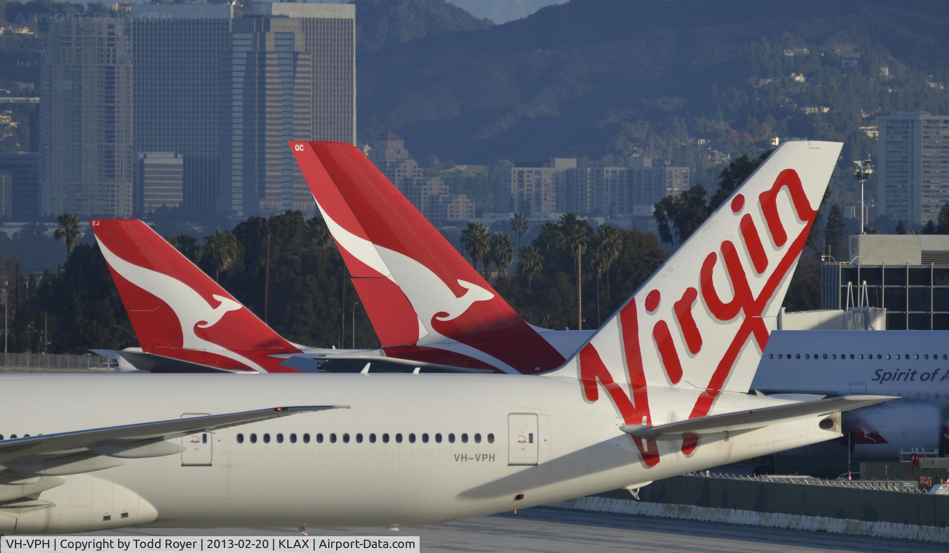 VH-VPH, 2010 Boeing 777-3ZG/ER C/N 37943, Taxiing past the competition