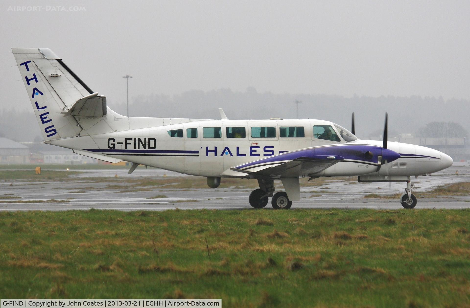 G-FIND, 1989 Reims F406 Caravan II C/N F406-0045, Waiting to depart in heavy rain