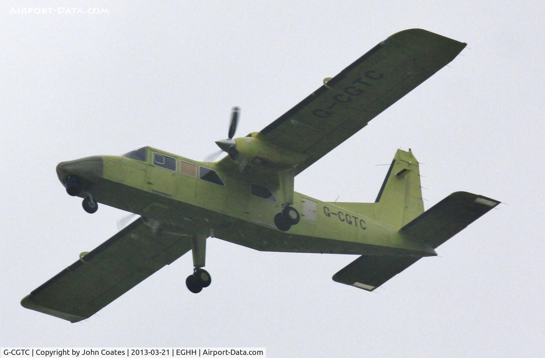 G-CGTC, 2010 Britten-Norman BN-2T-4S Defender AL.2 C/N 4019, Single low pass in heavy rain