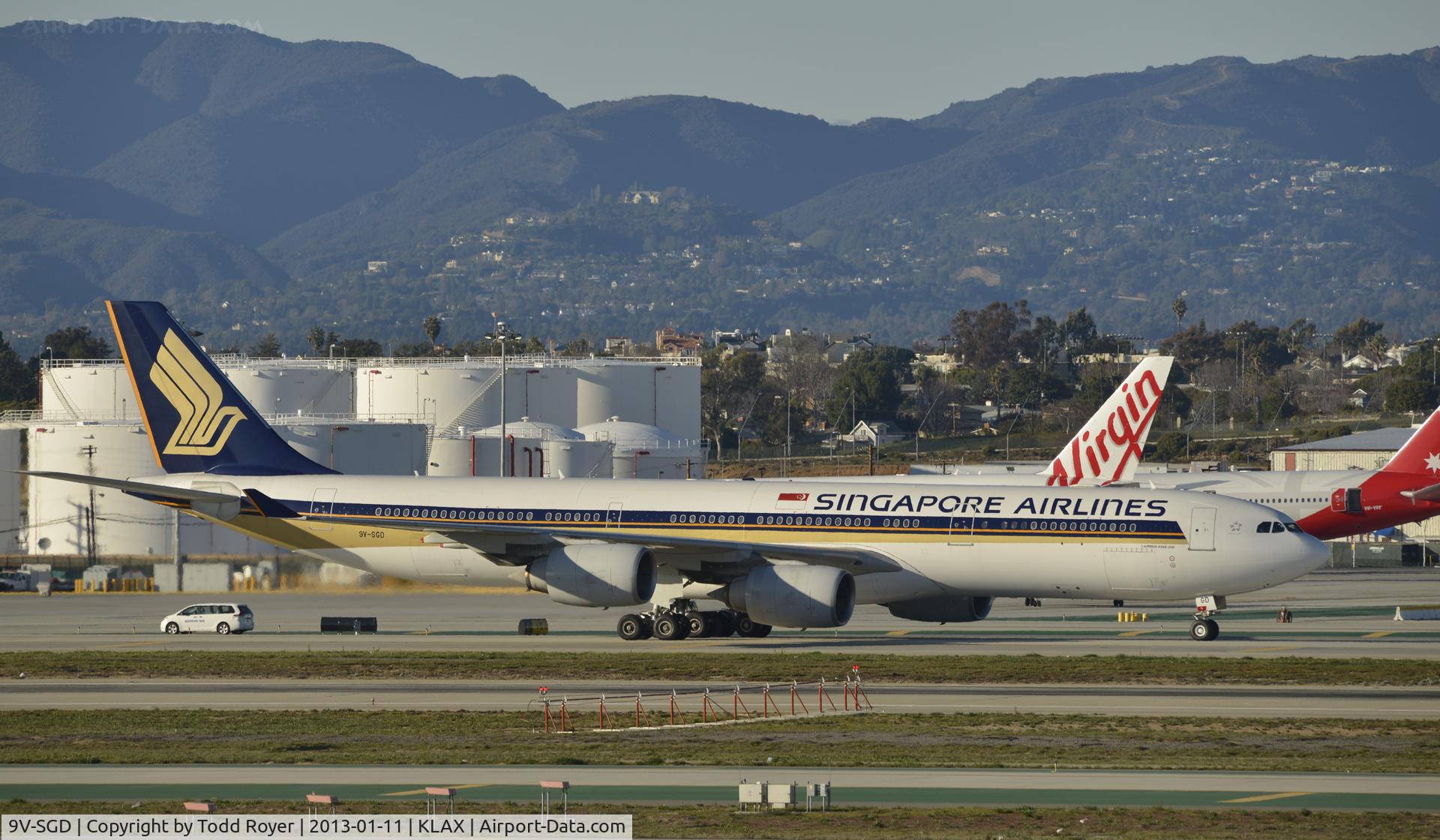 9V-SGD, 2004 Airbus A340-541 C/N 560, Taxiing to gate at LAX