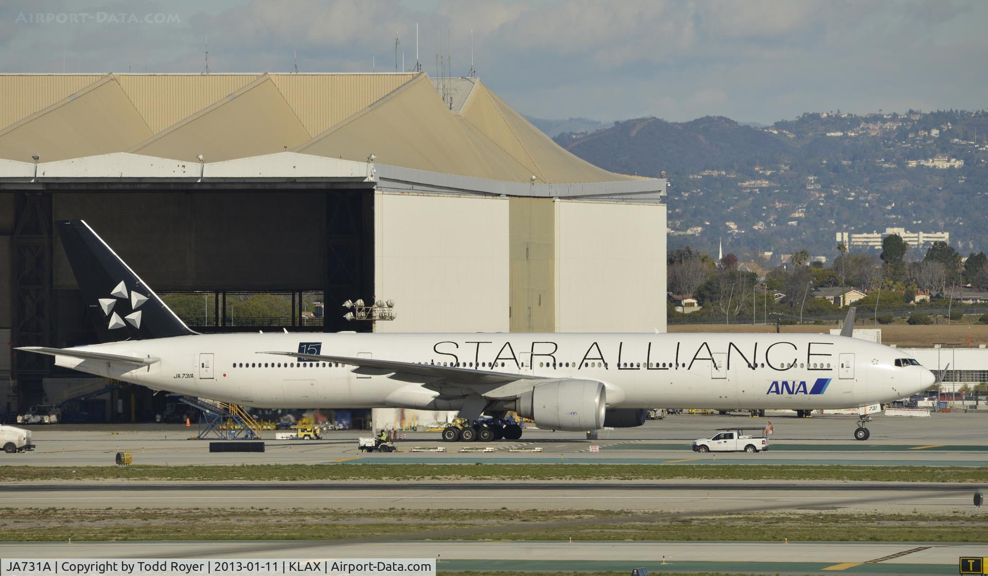 JA731A, 2004 Boeing 777-381/ER C/N 28281, Taxiing for departure at LAX