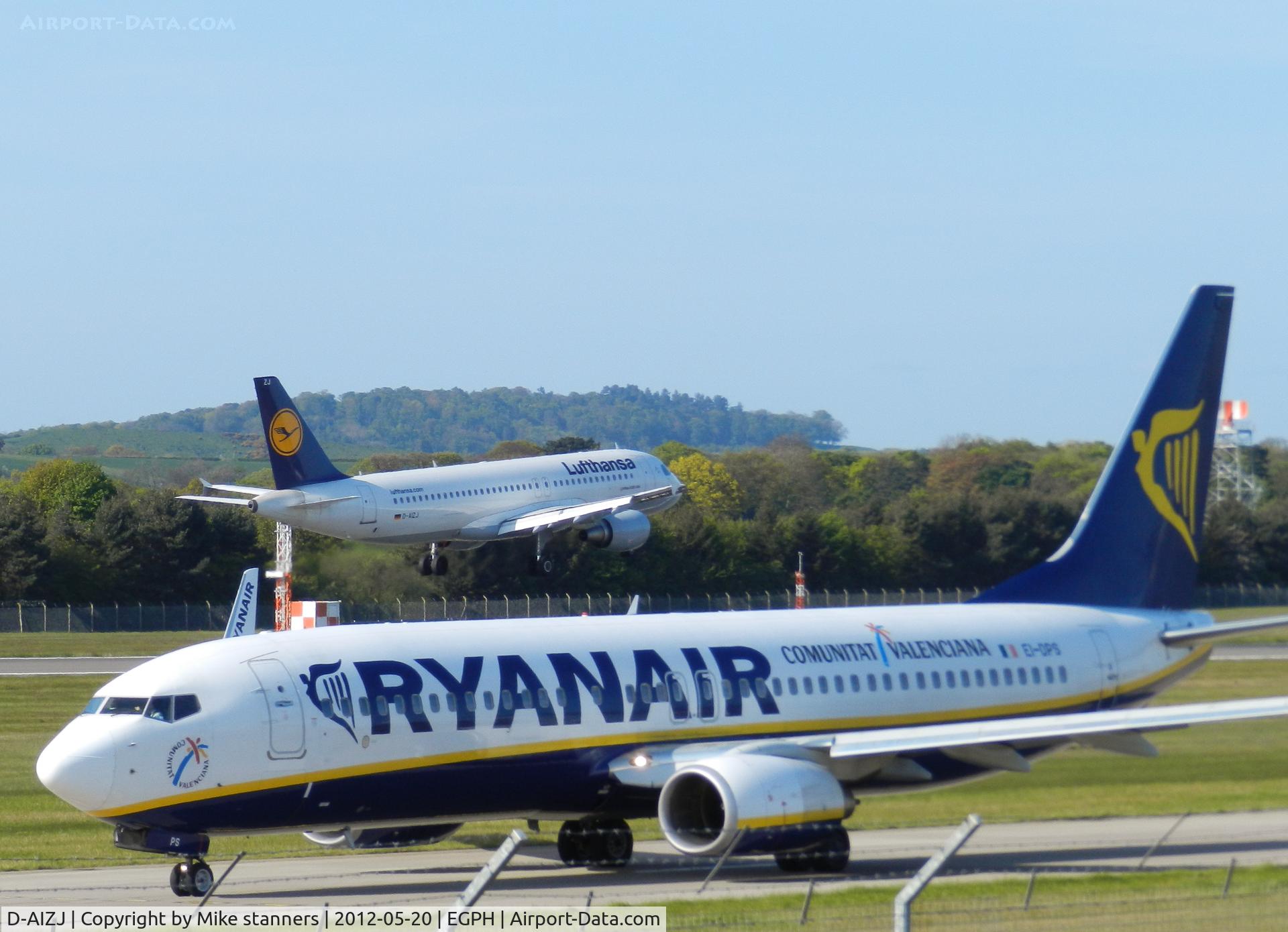 D-AIZJ, 2010 Airbus A320-214 C/N 4449, Lufthansa A320 Landing on runway 06 from FRA,While in the forground Ryanair B737-8AS EI-DPS Is taxiing to Runway 06