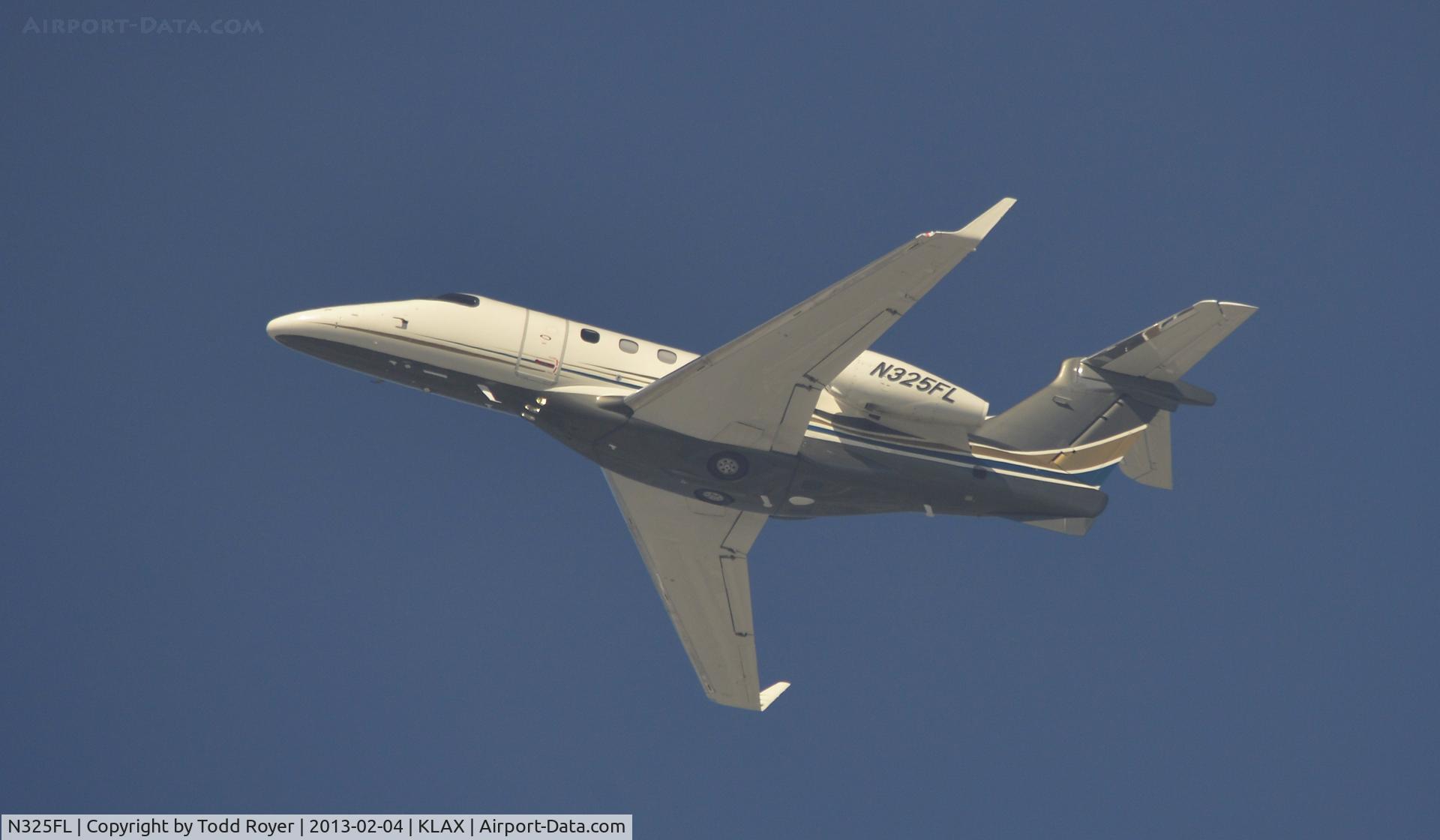 N325FL, 2012 Embraer EMB-505 Phenom 300 C/N 50500090, Departing LAX