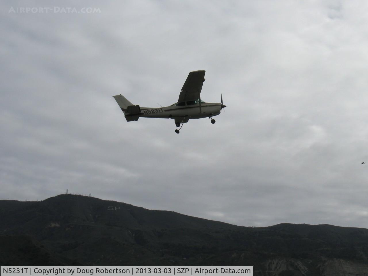N5231T, 1981 Cessna R182 Skylane RG C/N R18201839, 1981 Cessna R182 SKYLANE RG, Lycoming O-540-J3C5D 235 Hp, takeoff climb Rwy 22, gear coming up
