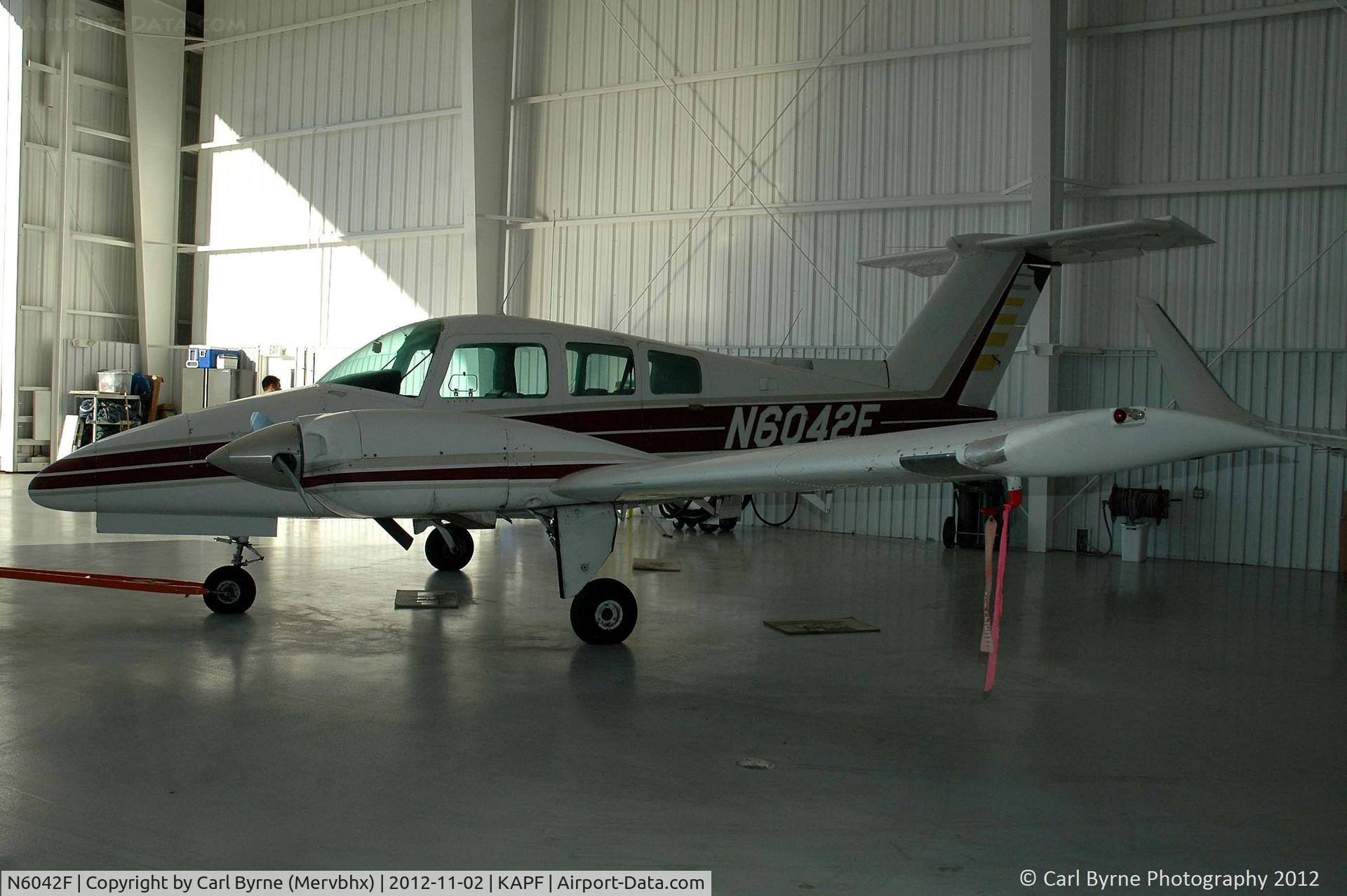 N6042F, 1979 Beech 76 Duchess C/N ME-176, Taken inside one of the hangars at Naples Municipal.