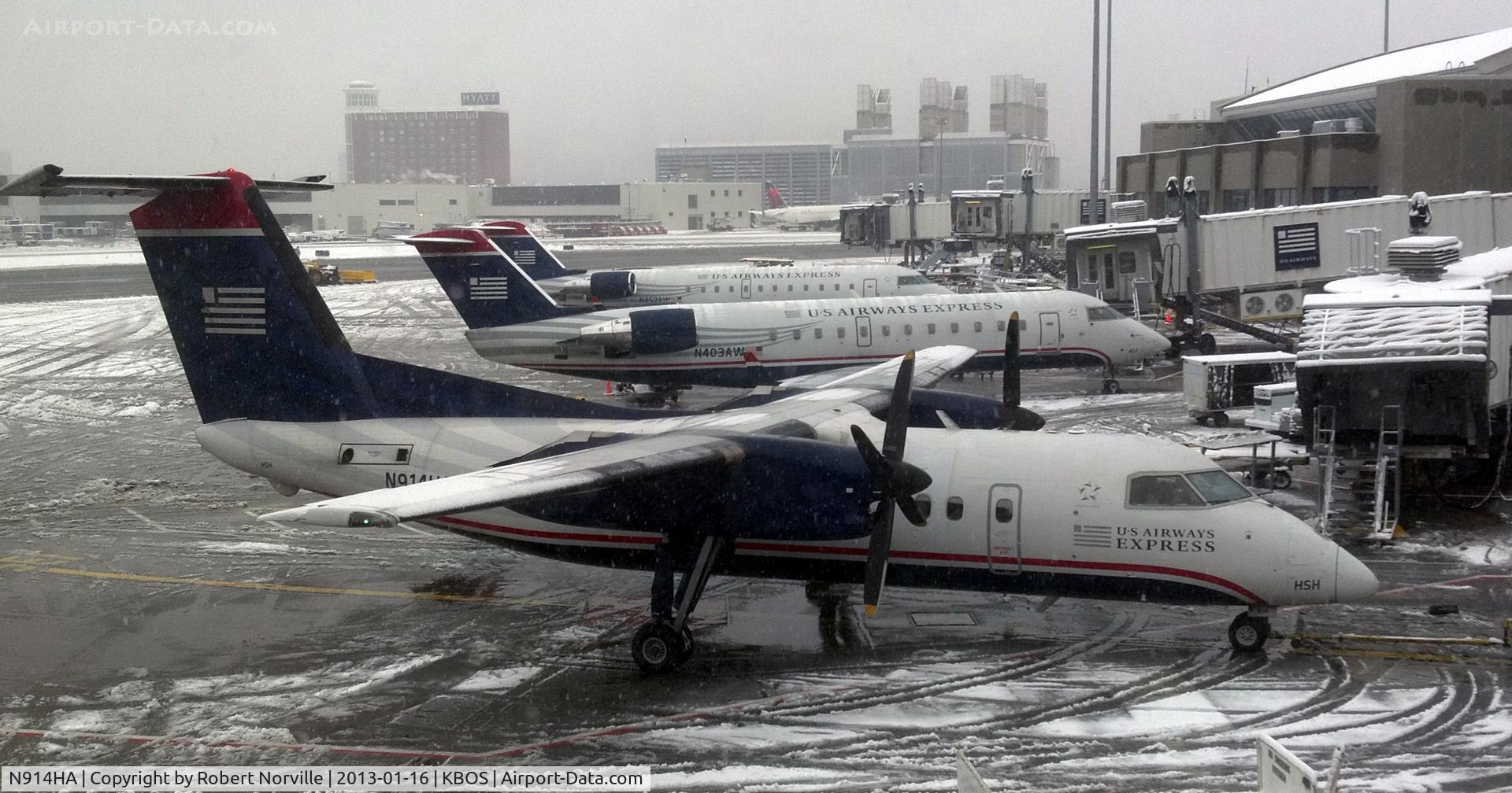 N914HA, 1986 De Havilland Canada DHC-8-102 Dash 8 C/N 053, In the snow - BostonPhotp with the permission of Ronbert Norville