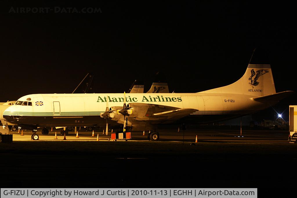 G-FIZU, 1960 Lockheed L-188C(F) Electra C/N 2014, Atlantic Airways, on the apron at night.