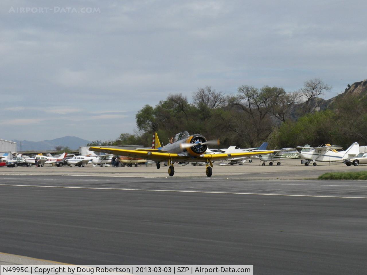 N4995C, 1949 North American T-6G Texan C/N 168-481, 1949 North American T-6G TEXAN 'Thirsty Girl', P&W R-1340 Wasp 600 Hp, 1949 Factory remanufacture, takeoff Rwy 22