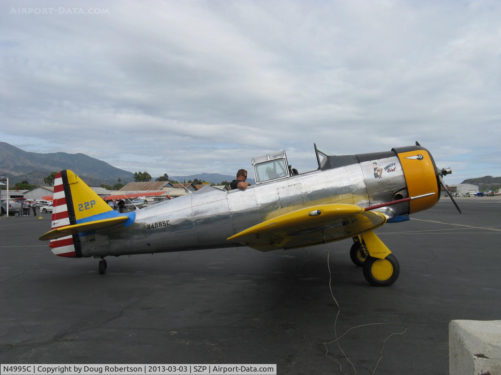 N4995C, 1949 North American T-6G Texan C/N 168-481, 1949 North American T-6G TEXAN 'Thirsty Girl', P&W R-1340 Wasp 600 Hp, 1949 Factory remanufacture, refueling the 'Thirsty Girl'