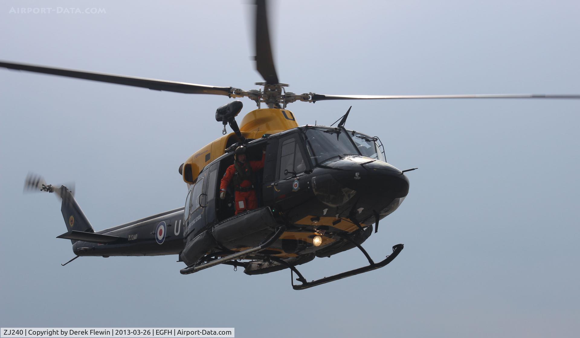 ZJ240, 1997 Bell 412EP Griffin HT1 C/N 36163, Hover taxi to hold.