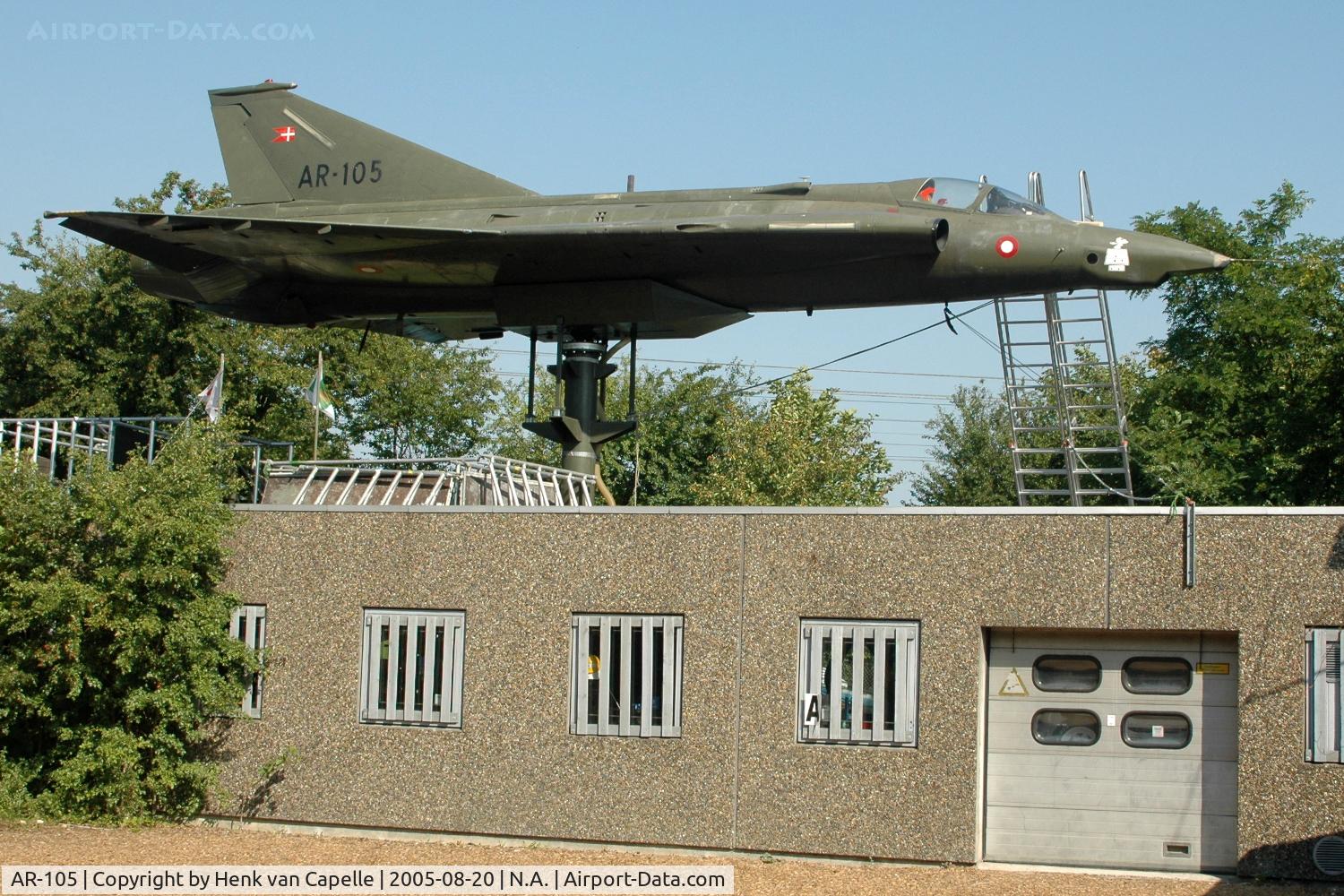 AR-105, 1971 Saab RF-35 Draken C/N 35-1105, A Saab RF35 Draken reconnaissance fighter mounted on a pole in Roskilde, Denmark. It was Intended as full-size moving flight simulator for (youthclub) Ungdomsklubben Viadukten.