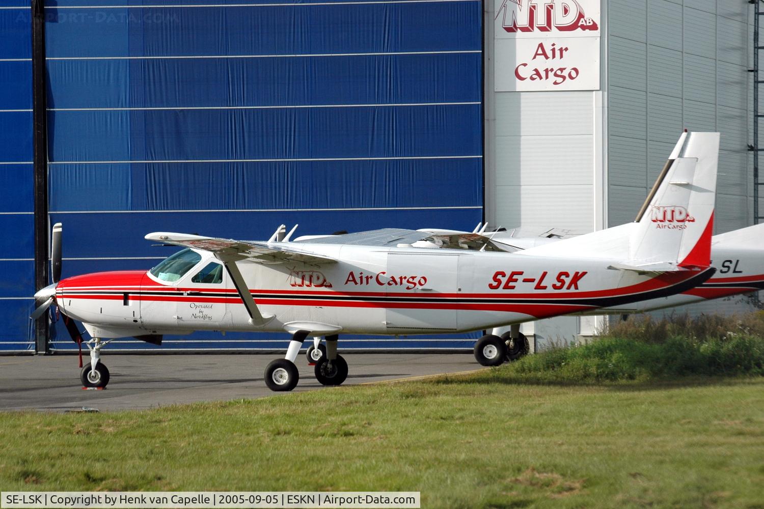 SE-LSK, 2003 Cessna 208B  Grand Caravan C/N 208B1012, A Cessna 208B operated by NTD Air Cargo in friont of its hangar at Nyköping Skavsta airport, Sweden.