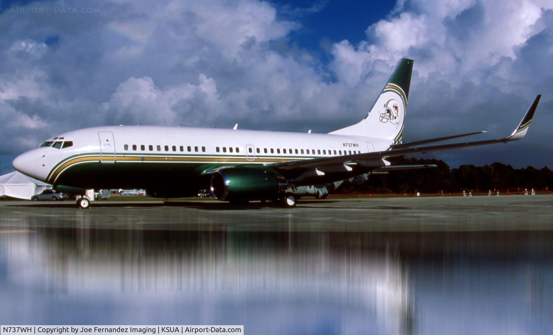 N737WH, 1998 Boeing 737-75T BBJ C/N 29142, Miami Dolphins tail. Originally from Kodachrome slide.