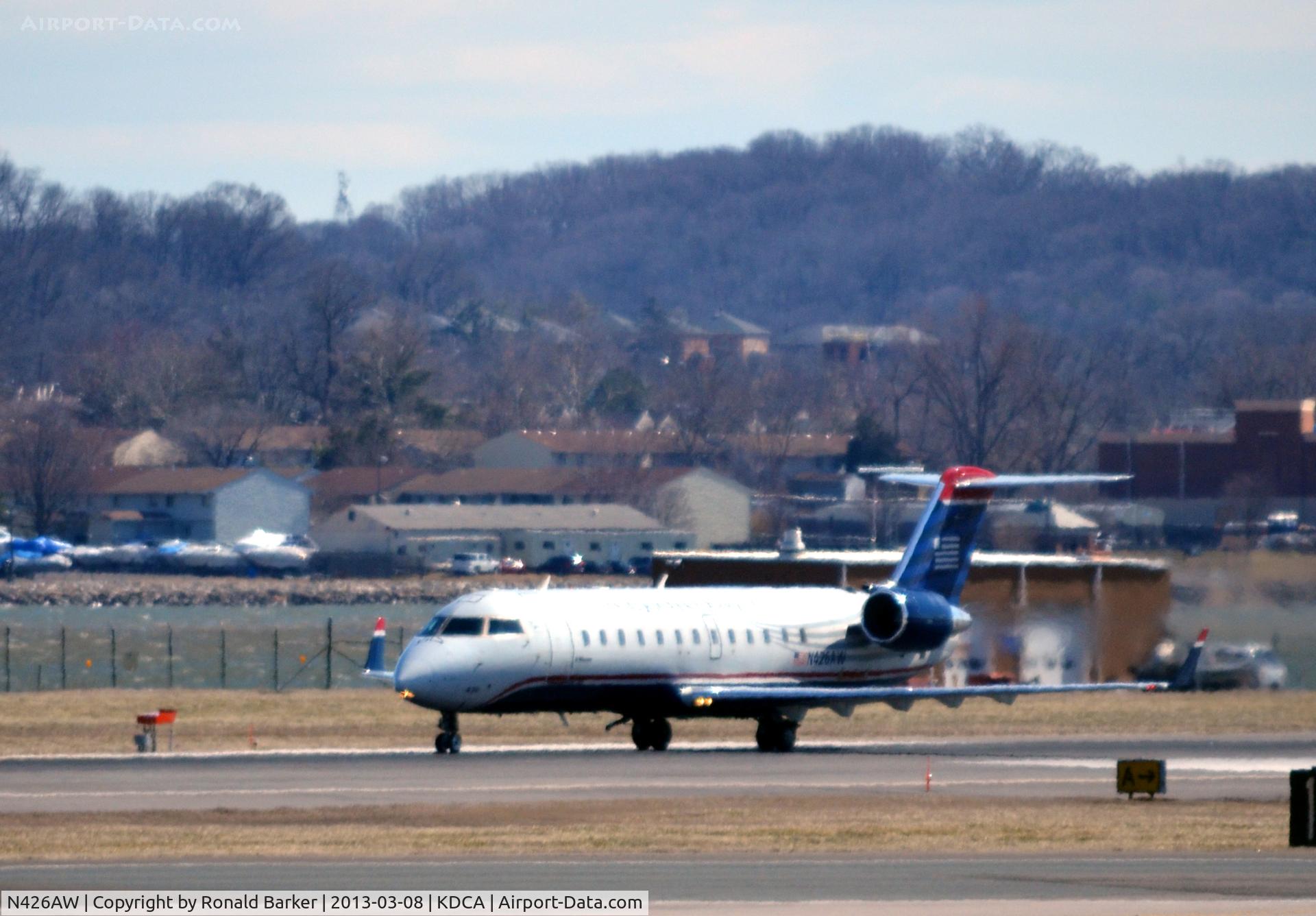 N426AW, 2002 Bombardier CRJ-200LR (CL-600-2B19) C/N 7669, Takeoff DCA