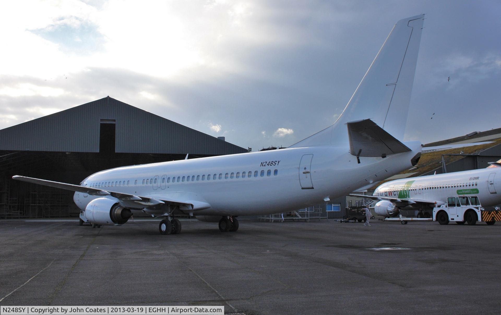 N248SY, 1991 Boeing 737-476 C/N 24438, Exiting paintshop after respray all white