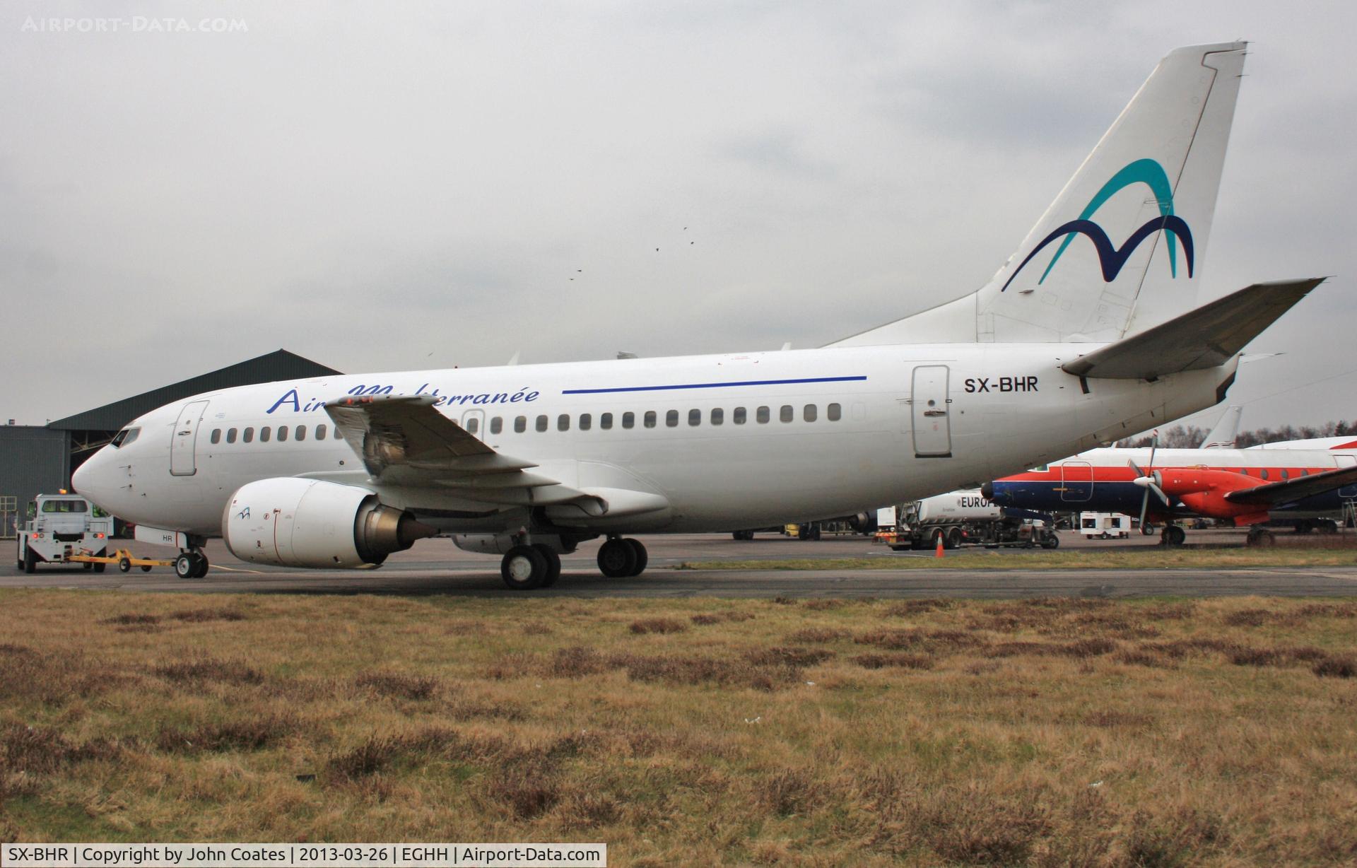 SX-BHR, 1998 Boeing 737-5L9 C/N 29234, Being towed into service bay at European Aviation