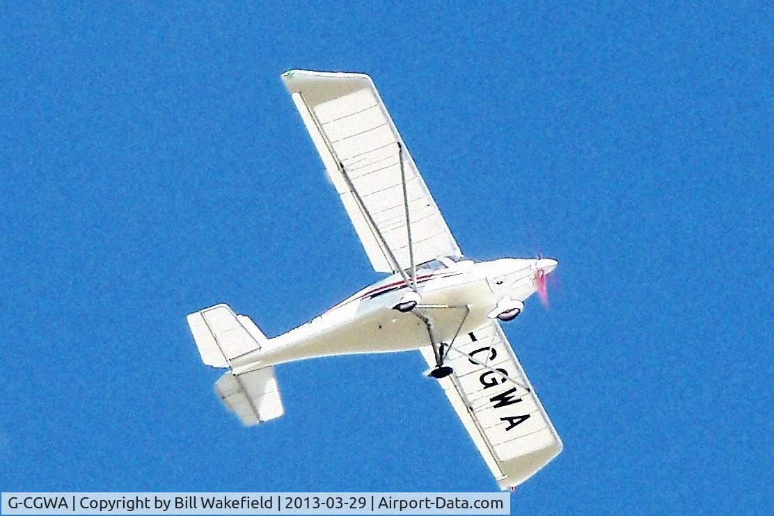 G-CGWA, 2011 Comco Ikarus C42 FB80 Bravo C/N 1103-7139, Taken today,29 March 2013,flying over How Tun Woods,Barrow in Furness.
