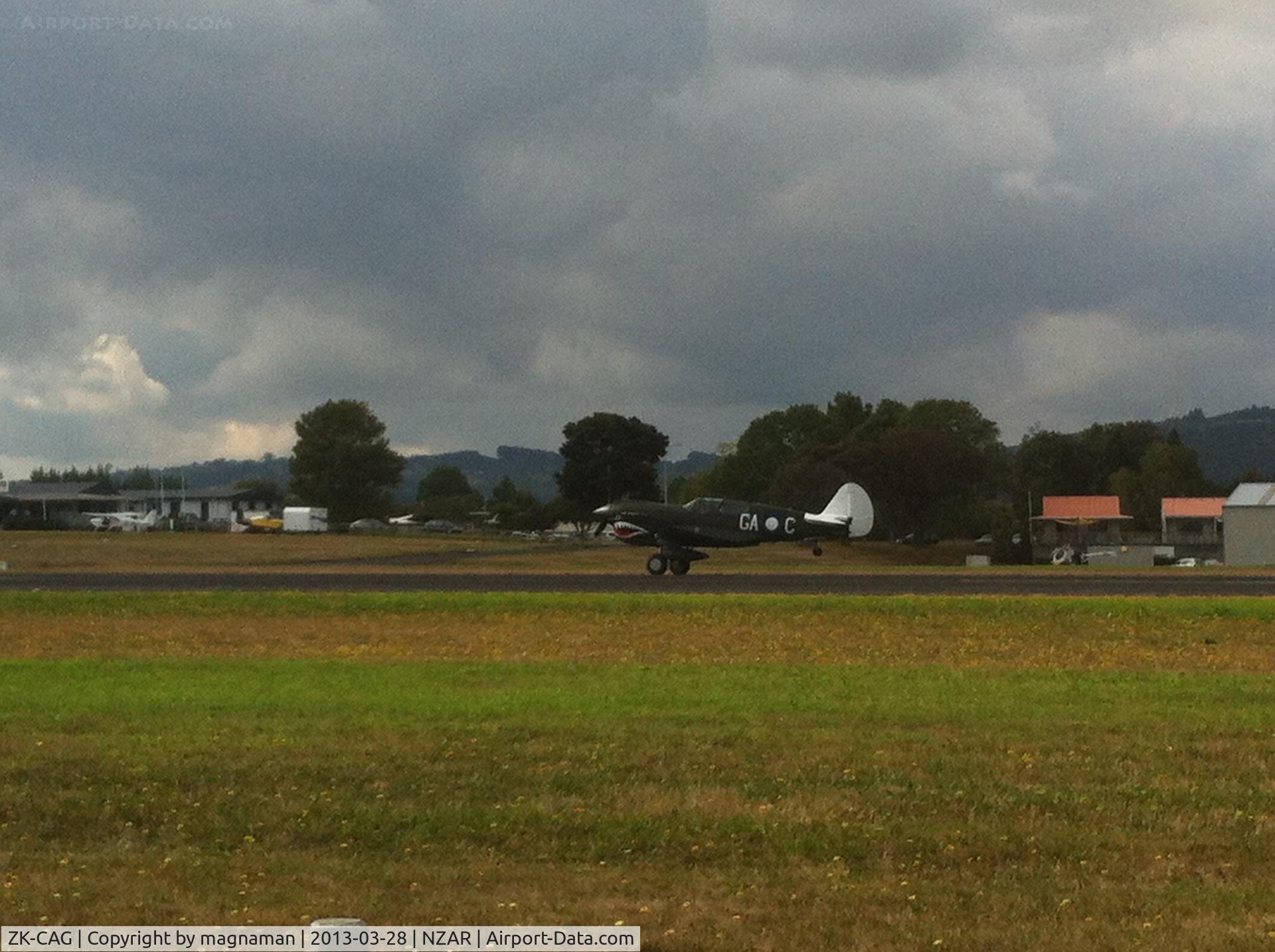 ZK-CAG, 1943 Curtiss P-40N Warhawk C/N 28492, Taking off after a spitfire preceded it by about 5 seconds - great sound.