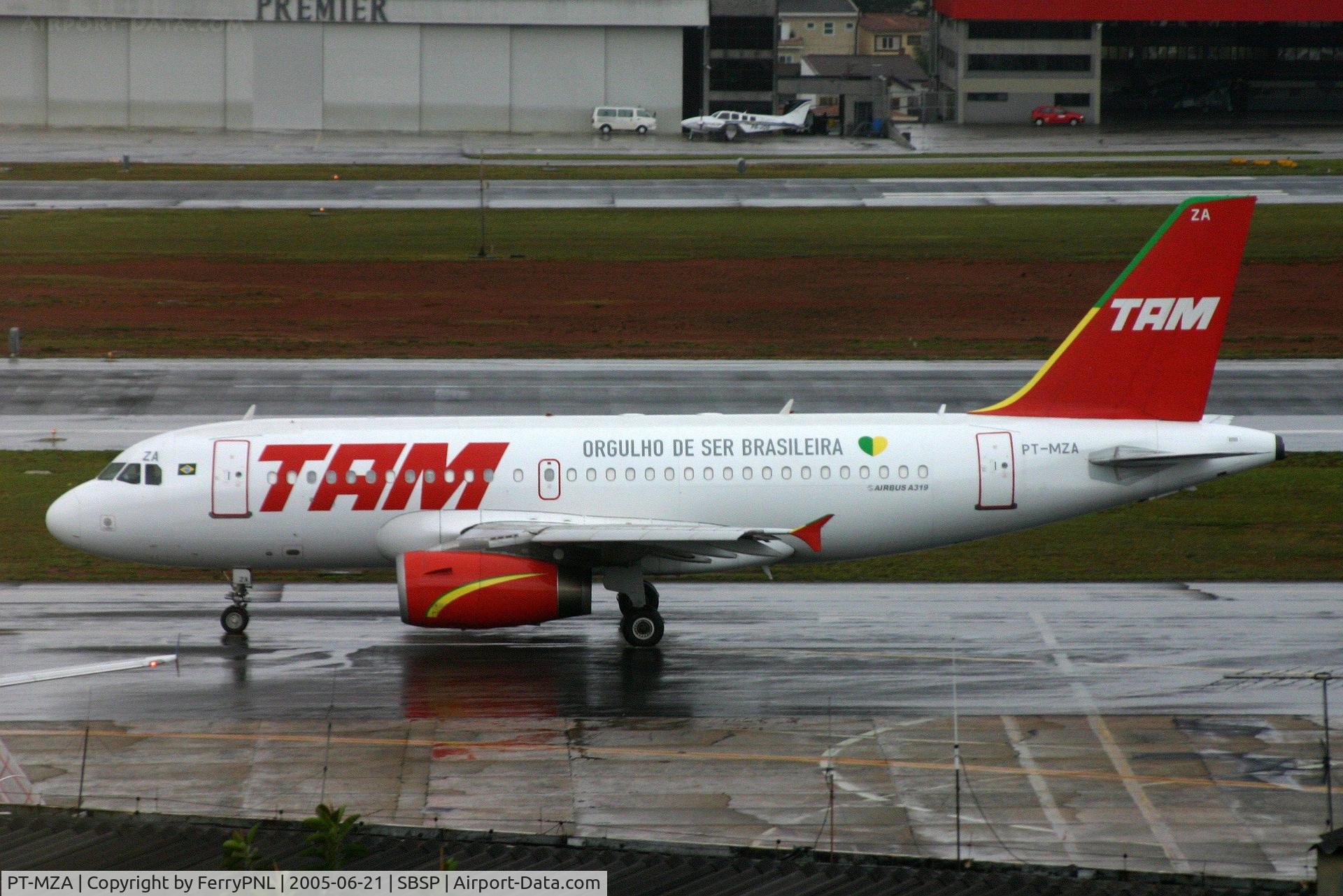PT-MZA, 1999 Airbus A319-132 C/N 0976, TAM A319 on a rainy day