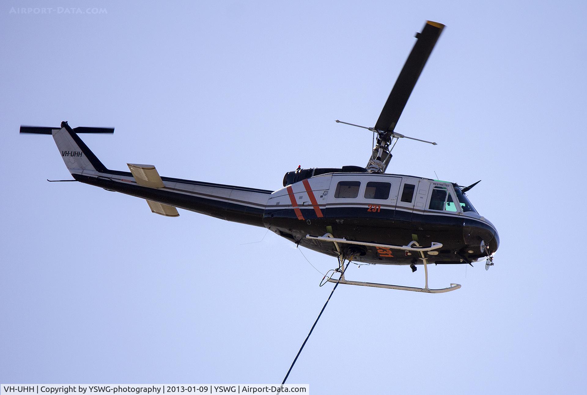 VH-UHH, Bell UH-1H Iroquois C/N 10661, Forest Air Helicopters (VH-UHH) Bell UH-1H Iroquois taking off from Wagga Wagga Airport.