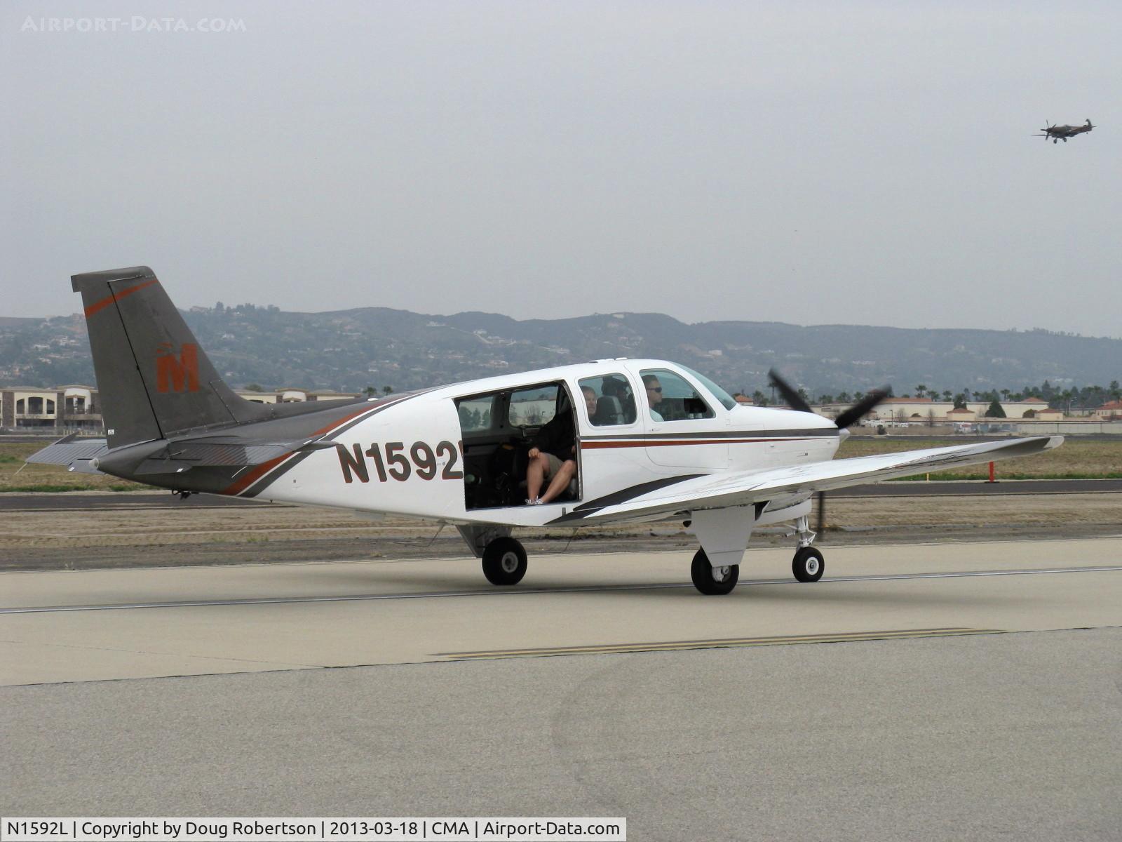N1592L, 1976 Beech A36 Bonanza 36 C/N E-832, 1976 Beech A36 BONANZA, Continental IO-520 285 Hp, modified for aerial photography of warbirds. See MyBombshells.com, taxi