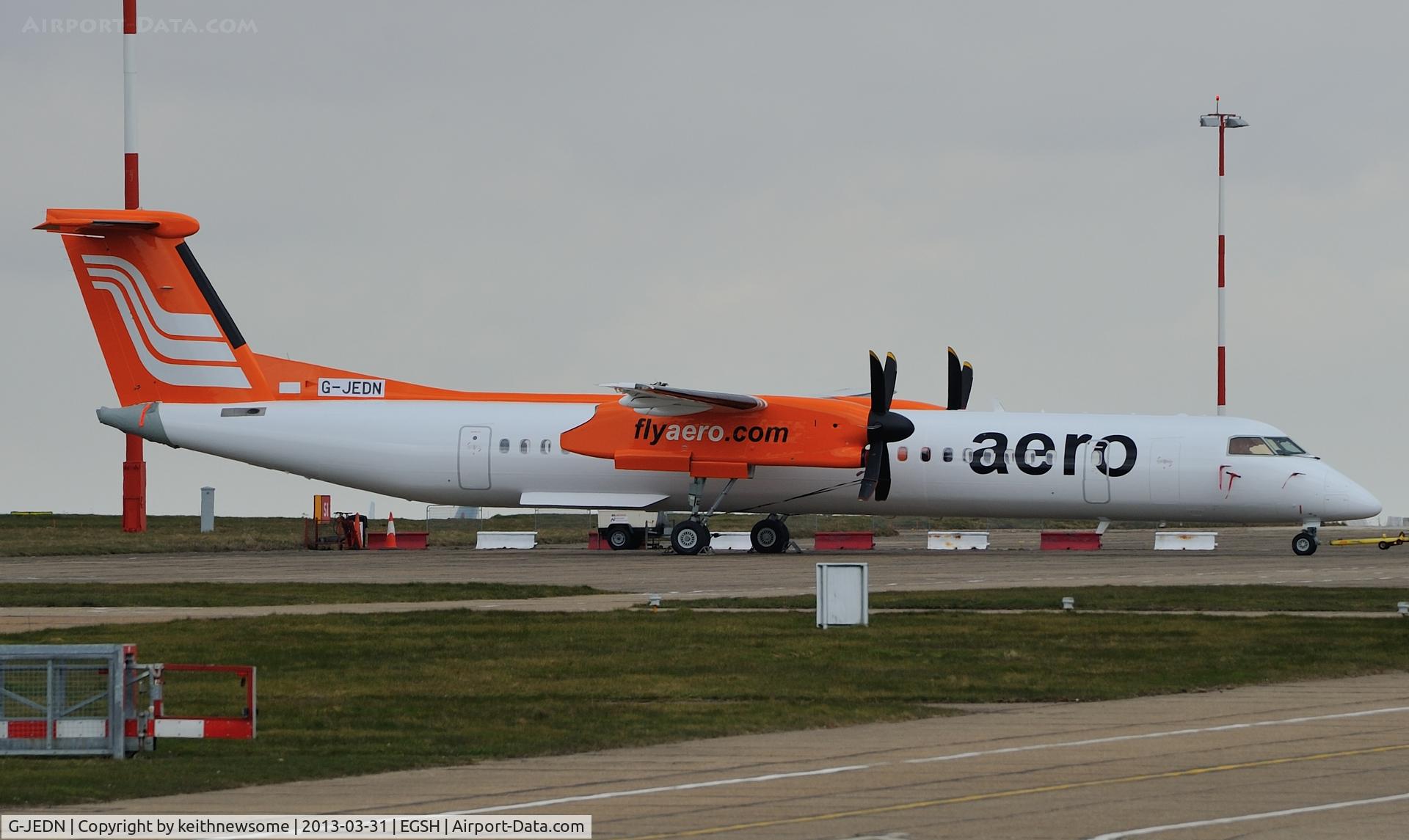 G-JEDN, 2003 De Havilland Canada DHC-8-402Q Dash 8 C/N 4078, Parked following spray !