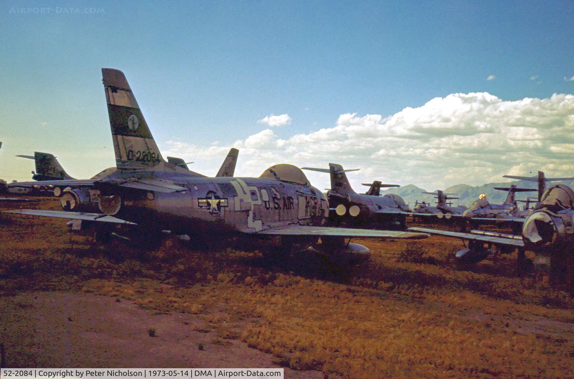 52-2084, 1952 North American F-86H Sabre C/N 187-110, F-86H Sabre of 196th Fighter Interceptor Squadron California ANG in storage at what was then known as the Military Aircraft Storage & Disposition - MASDC - in May 1973.
