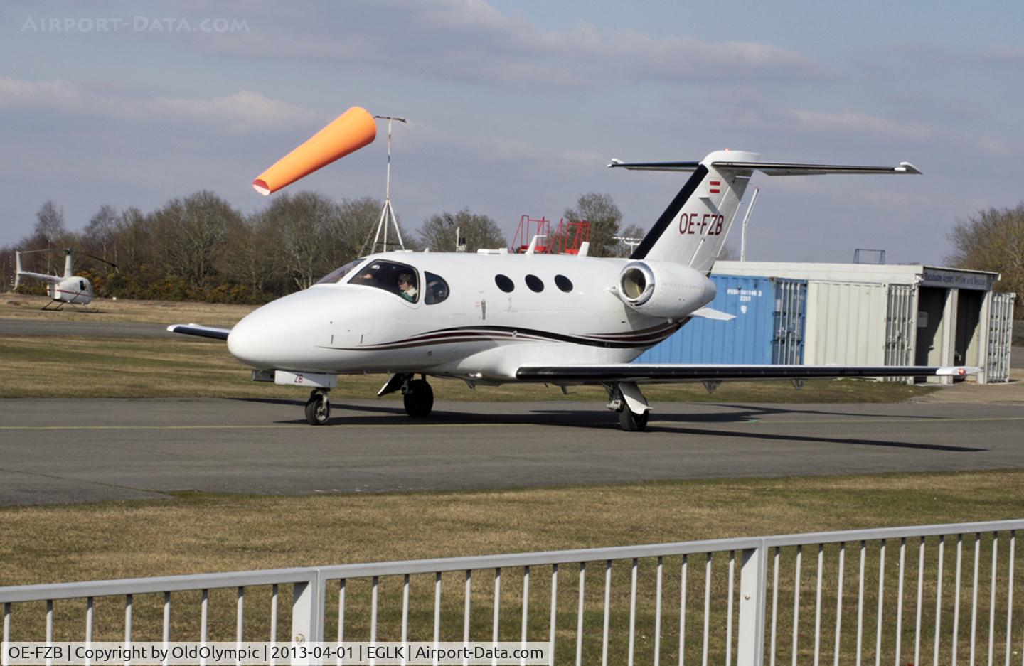 OE-FZB, 2008 Cessna 510 Citation Mustang Citation Mustang C/N 510-0145, Taxying past Bushe Cafe for  departure R/W 07