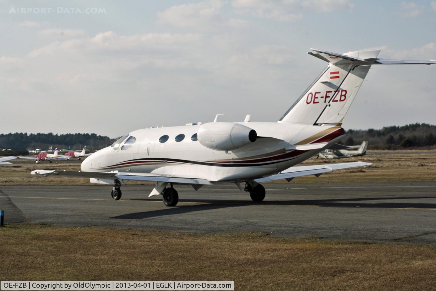 OE-FZB, 2008 Cessna 510 Citation Mustang Citation Mustang C/N 510-0145, Taxying past Bushe Cafe for  departure R/W 07