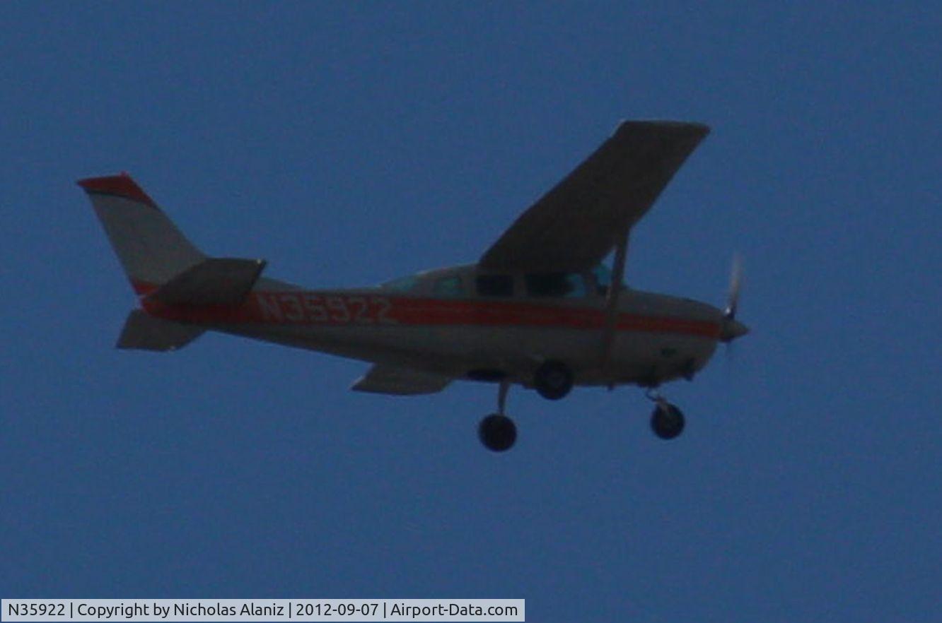 N35922, 1975 Cessna TU206F Turbo Stationair C/N U20602801, Flying over Ontario California, 4:25 p.m. September 7, 2012.