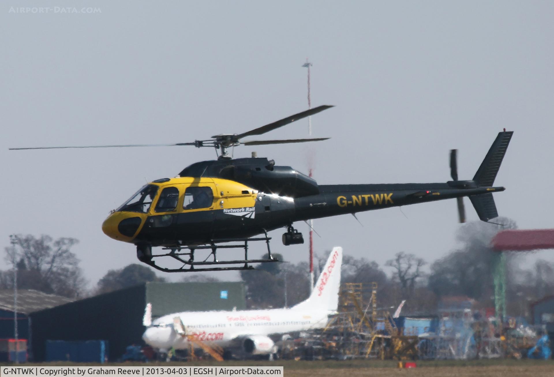 G-NTWK, 1986 Aerospatiale AS-355F-1 Twin Squirrel C/N 5347, Departing from Norwich.